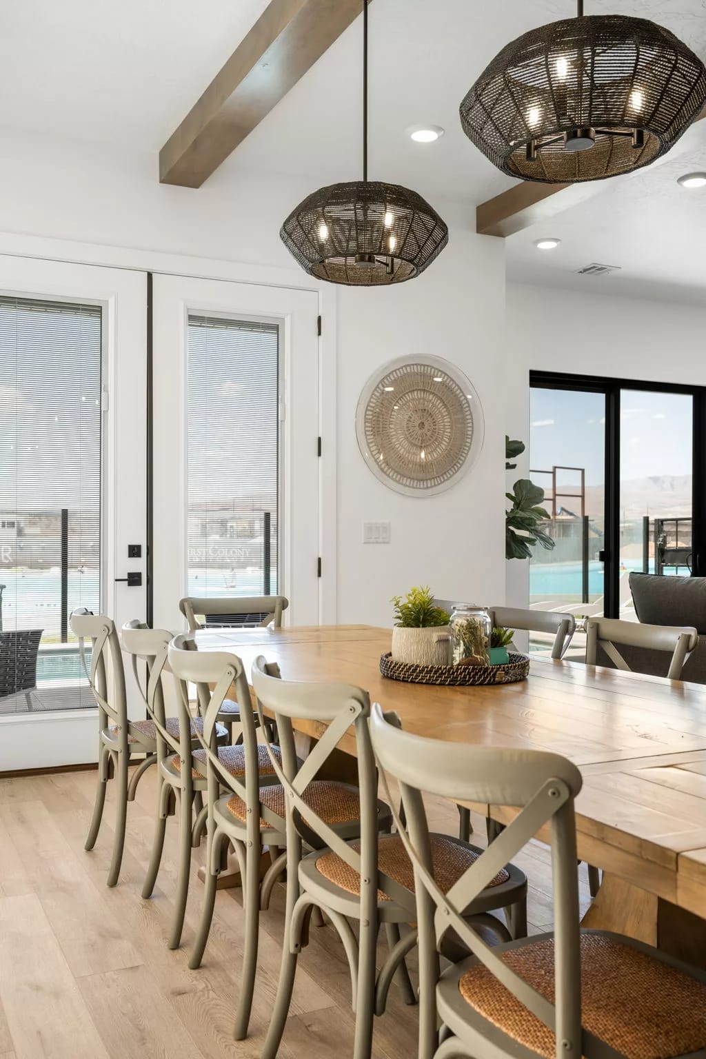 Dining area with large wooden table.