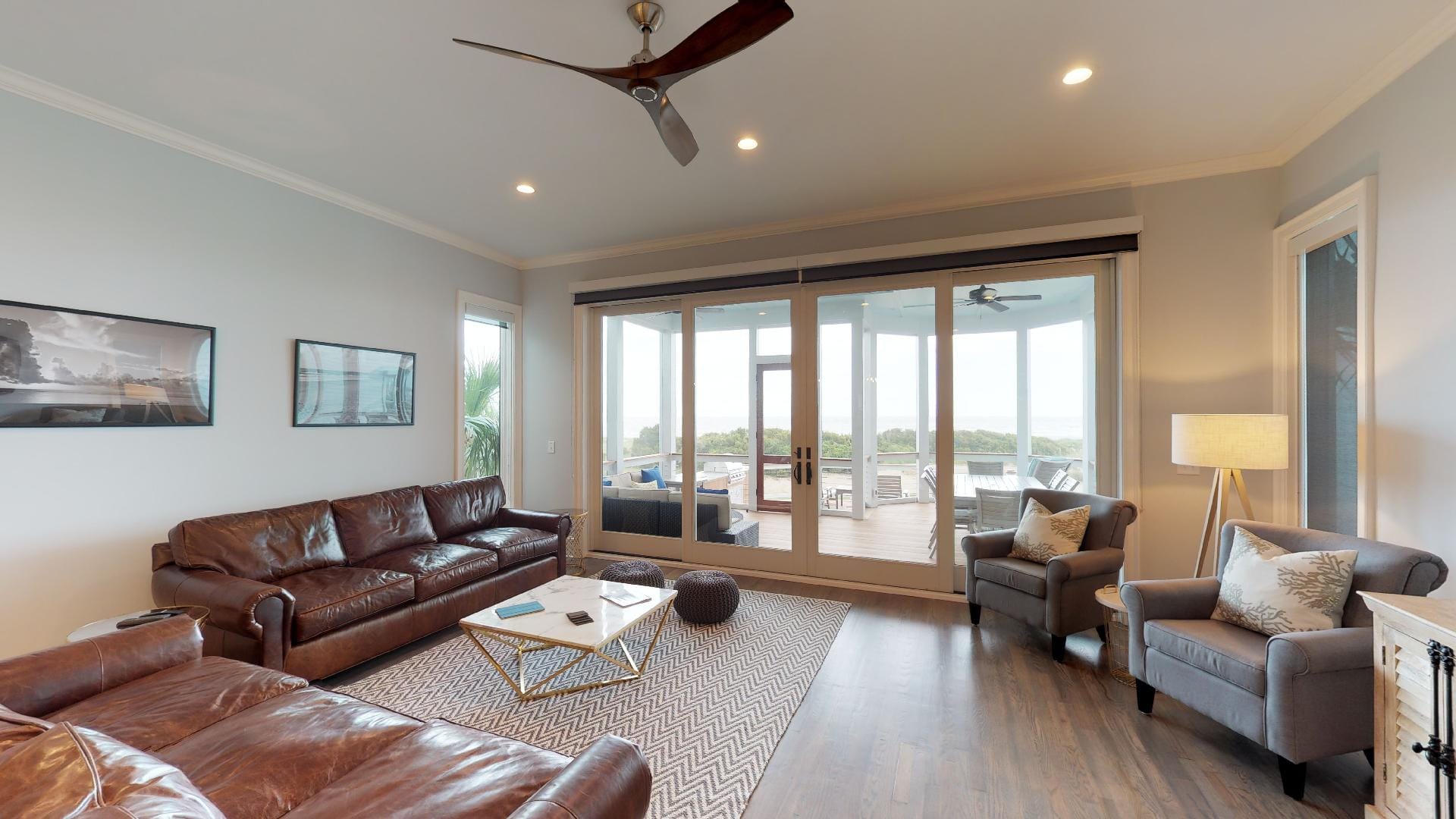 Modern living room with large windows.