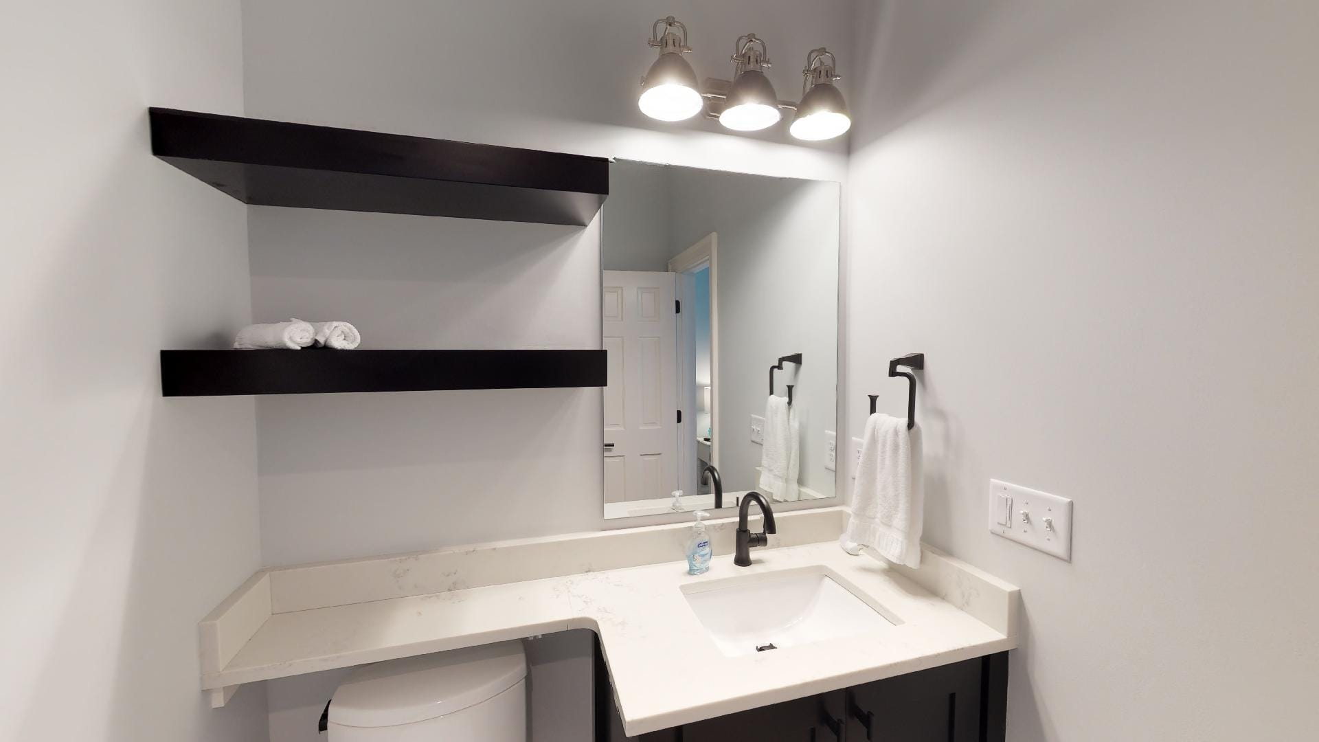 Modern bathroom sink and mirror.