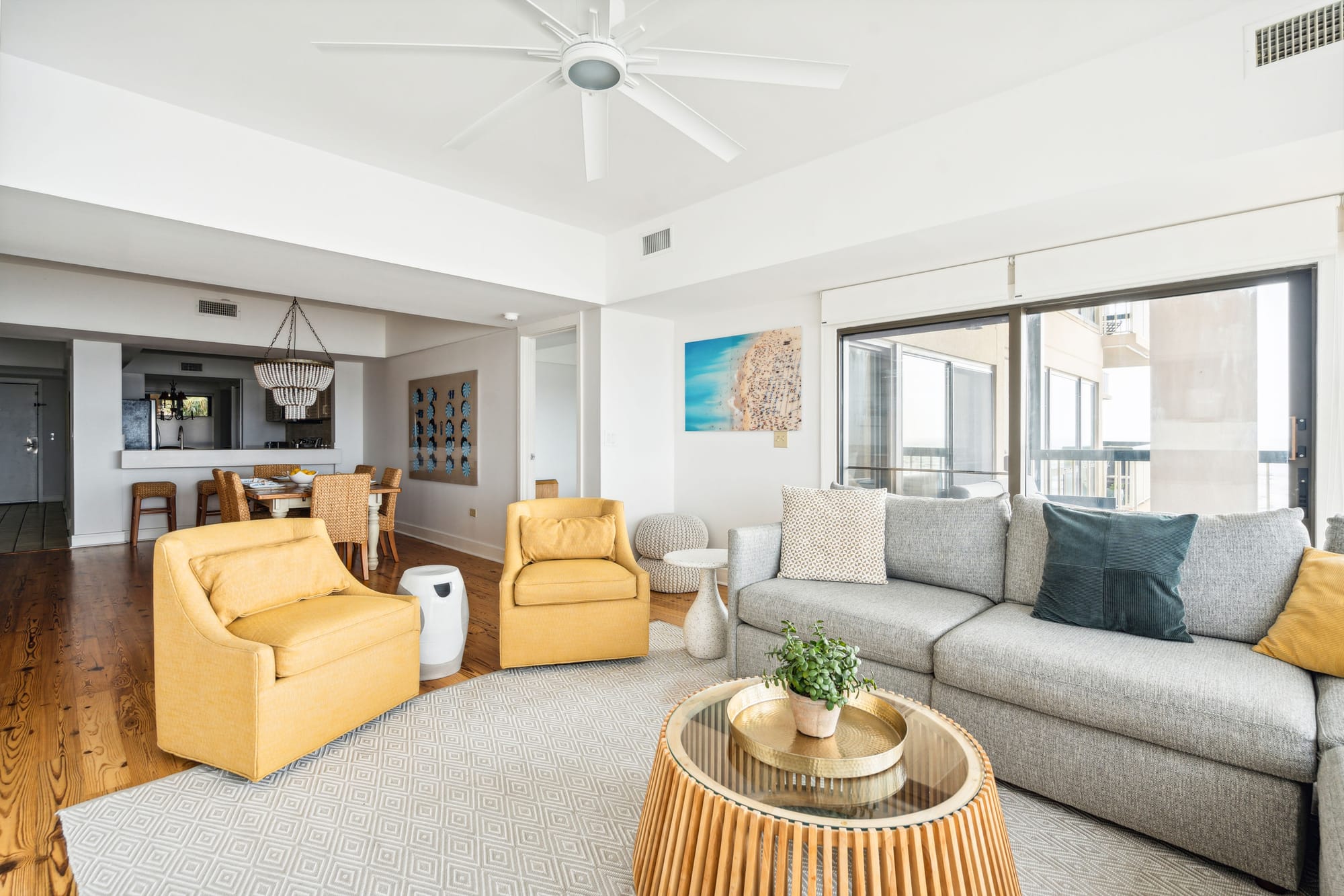 Modern living room with yellow chairs.