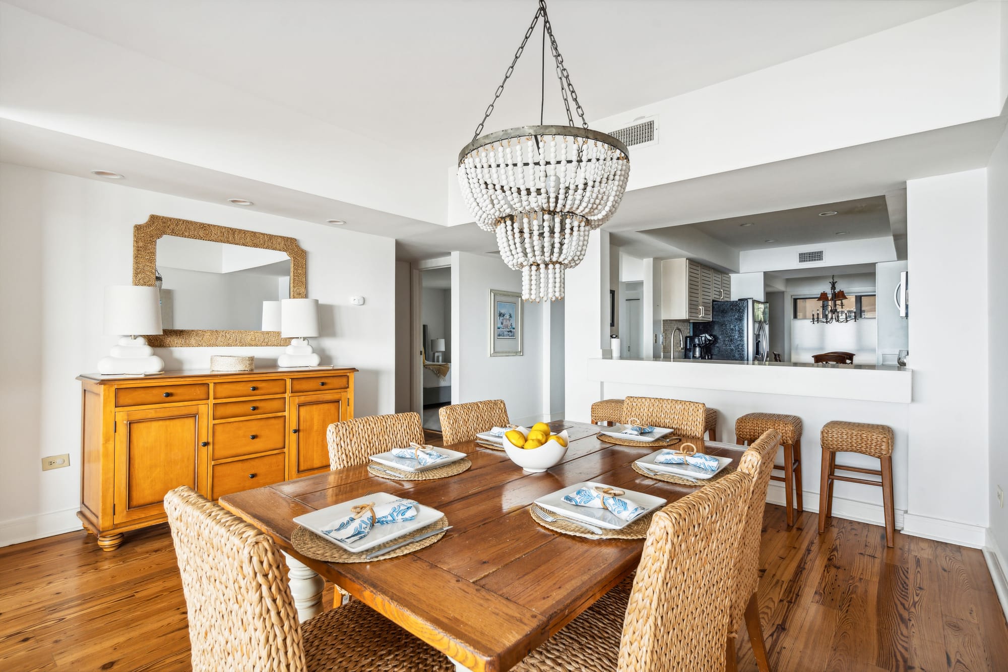 Dining room with woven chairs.