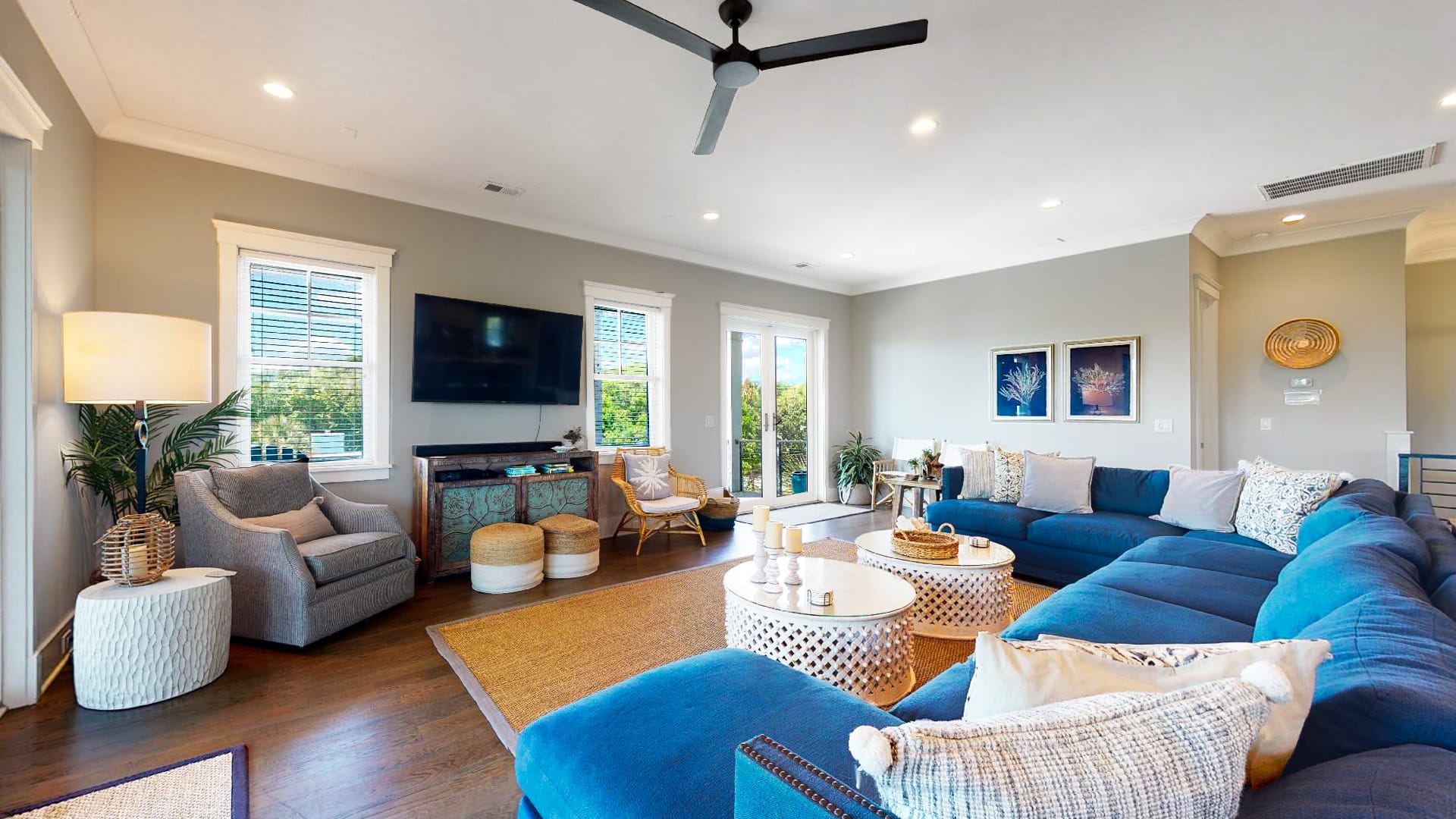 Modern living room with blue sofa.