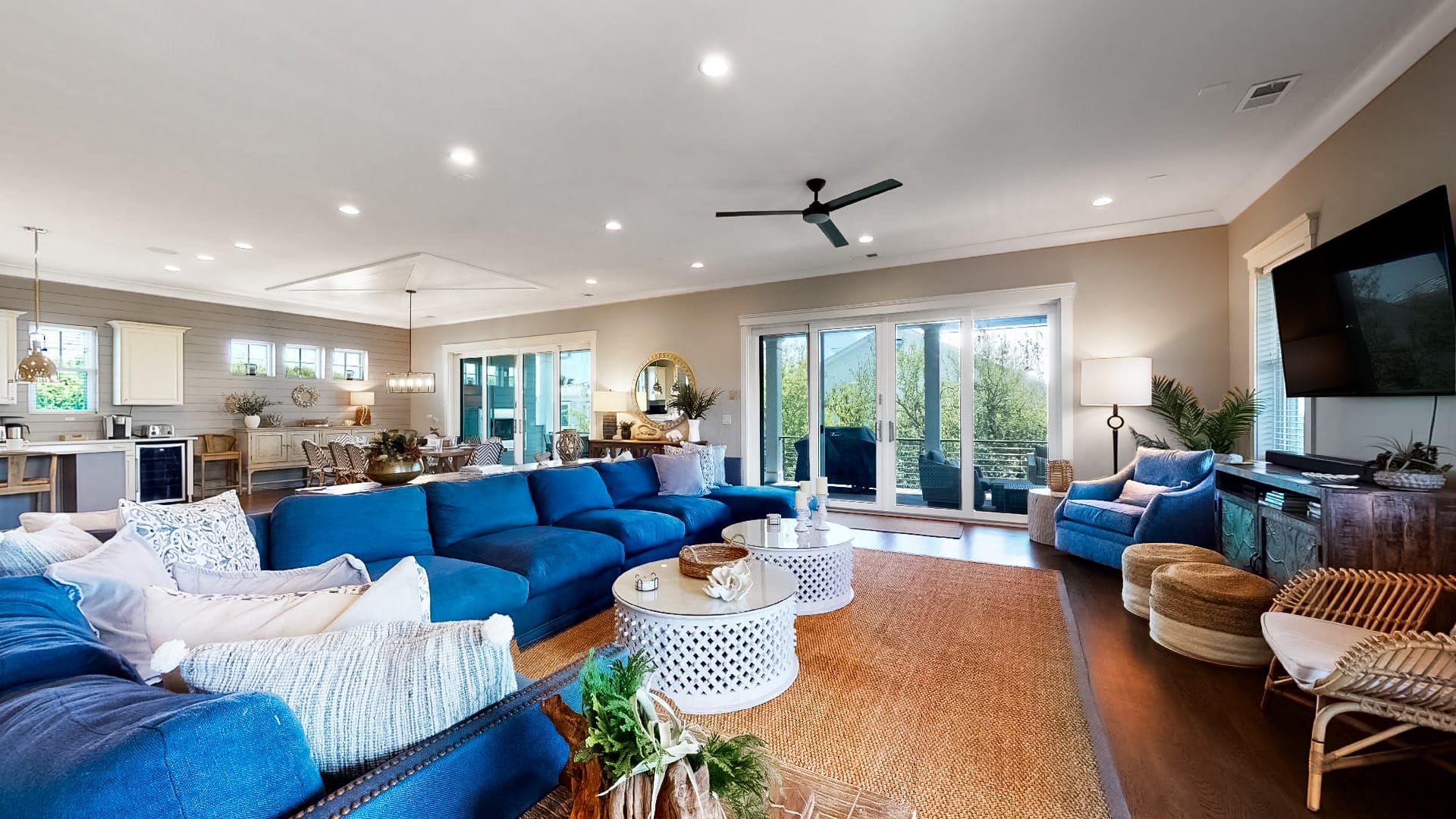 Modern living room with blue sofa.