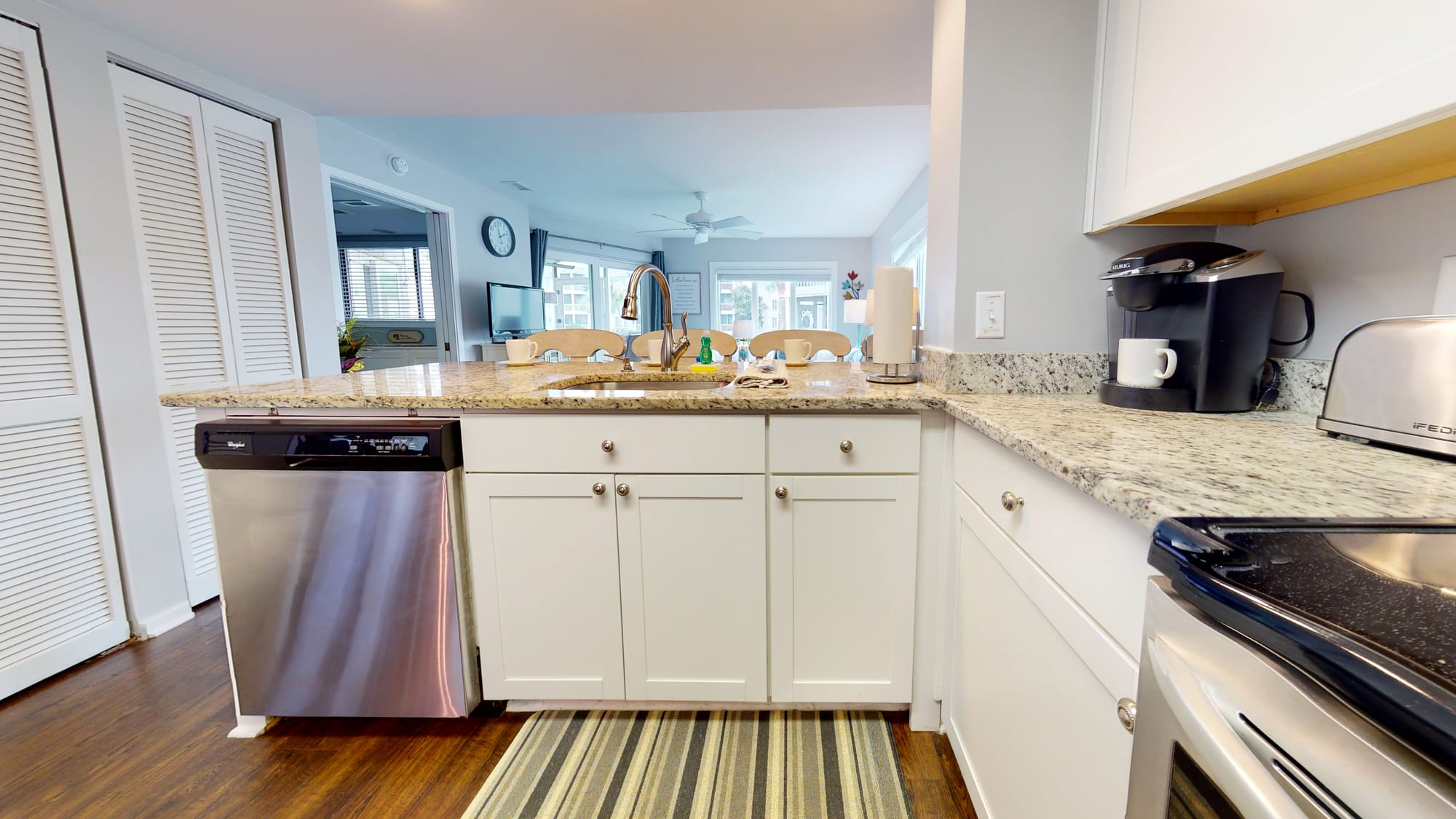 Modern kitchen with granite countertops.