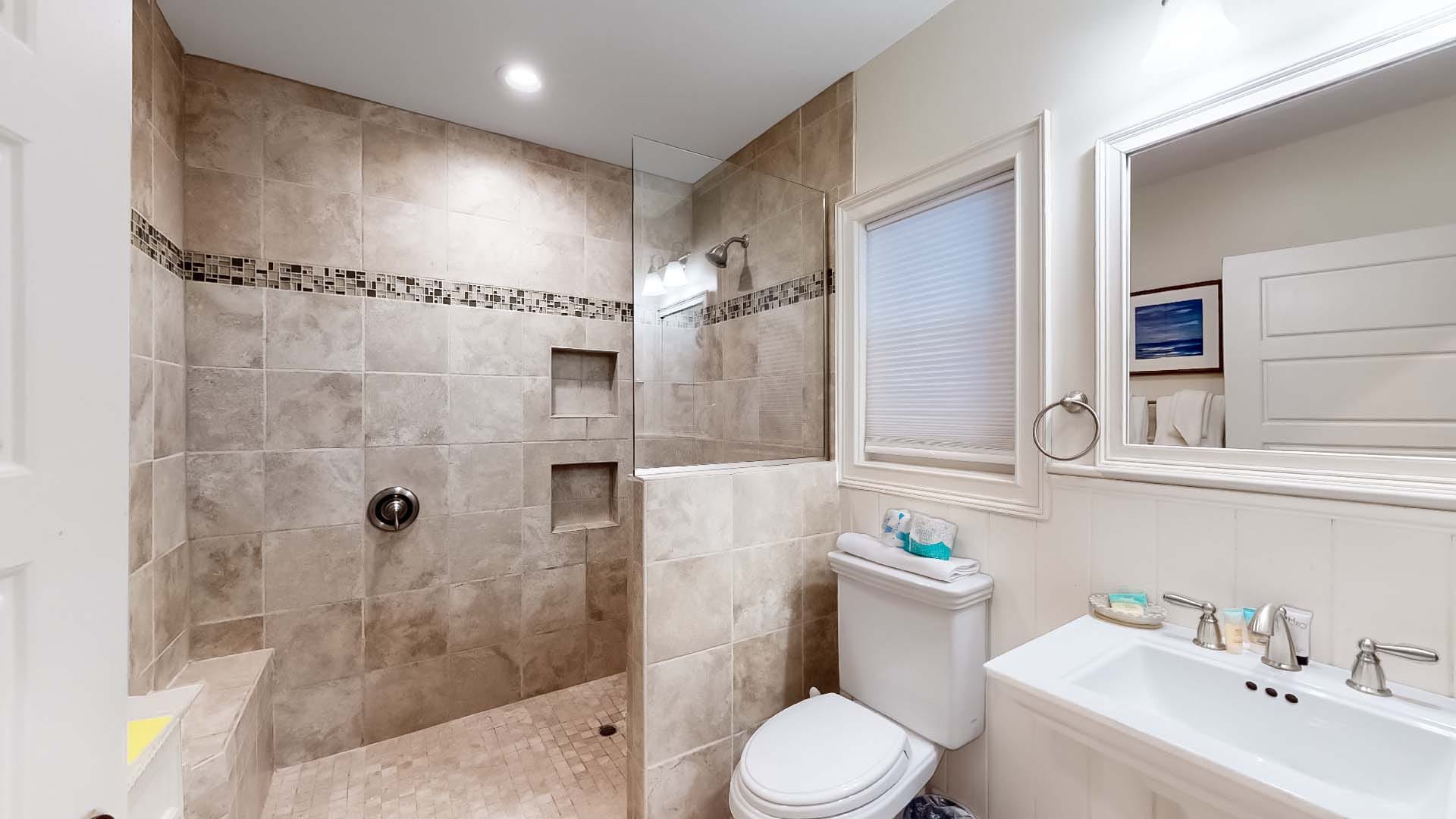 Modern bathroom with walk-in shower.