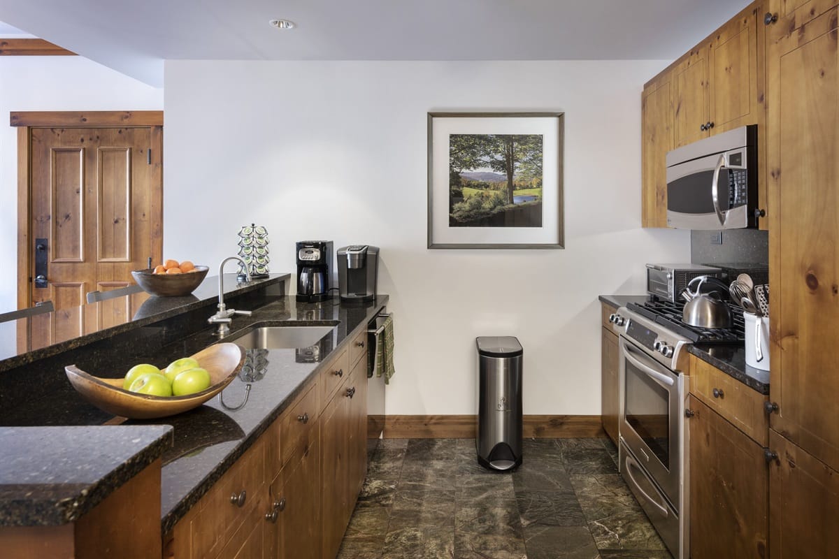 Modern kitchen with wooden cabinets.