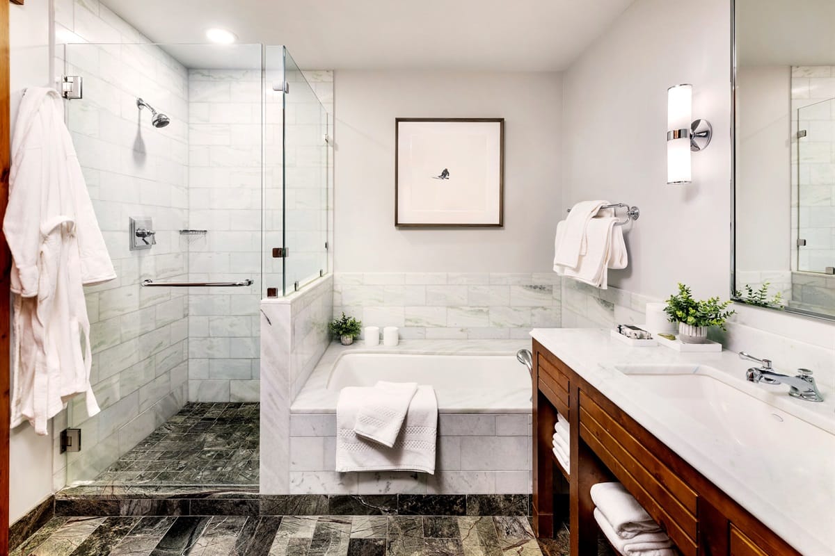 Modern bathroom with shower and tub.