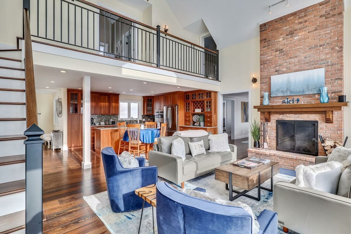 Modern living room with brick fireplace.