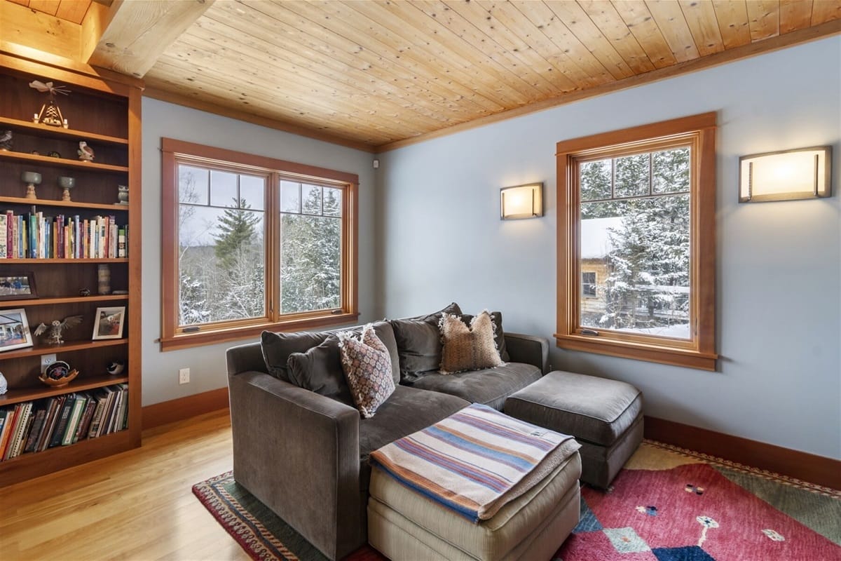 Cozy living room with bookshelf.