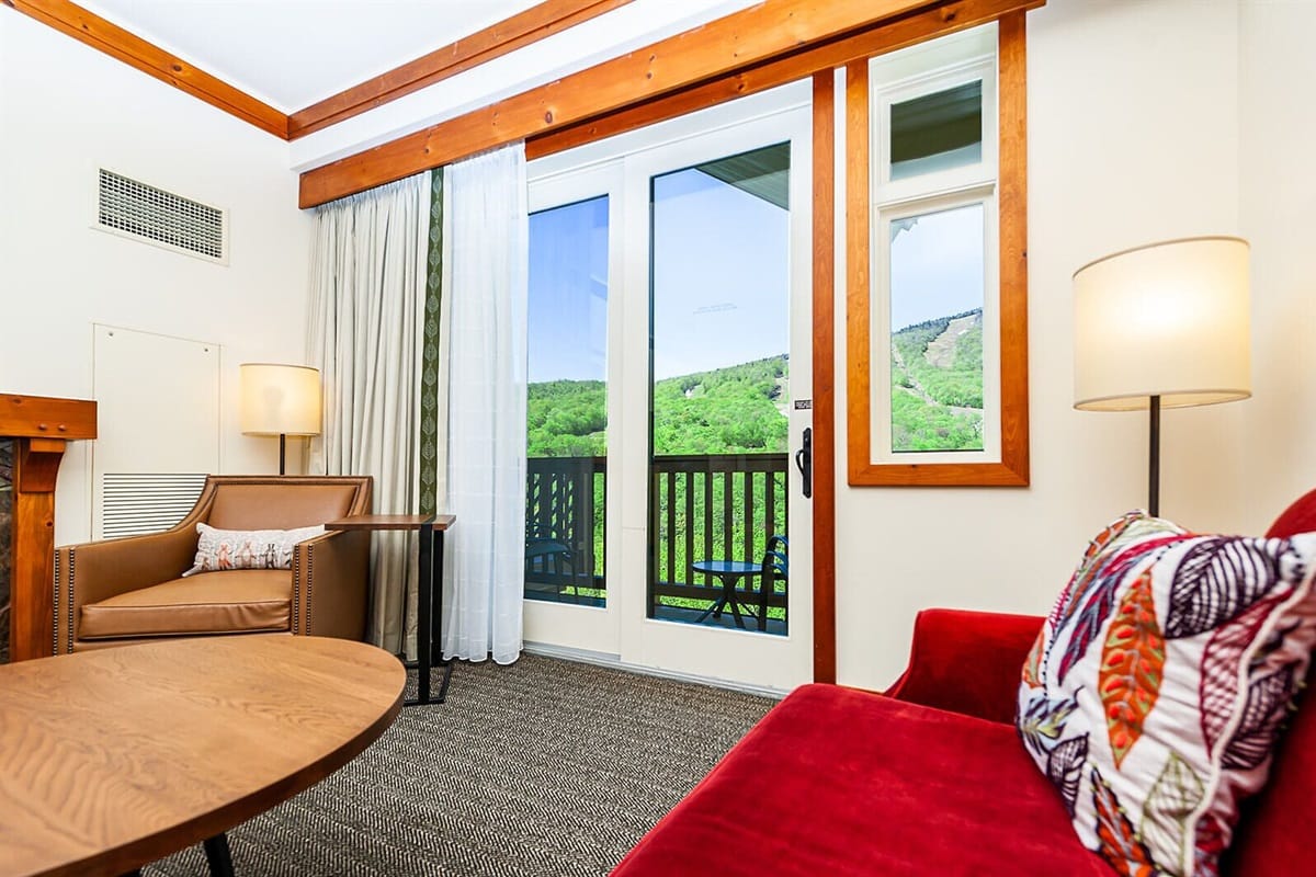 Living room with balcony view.