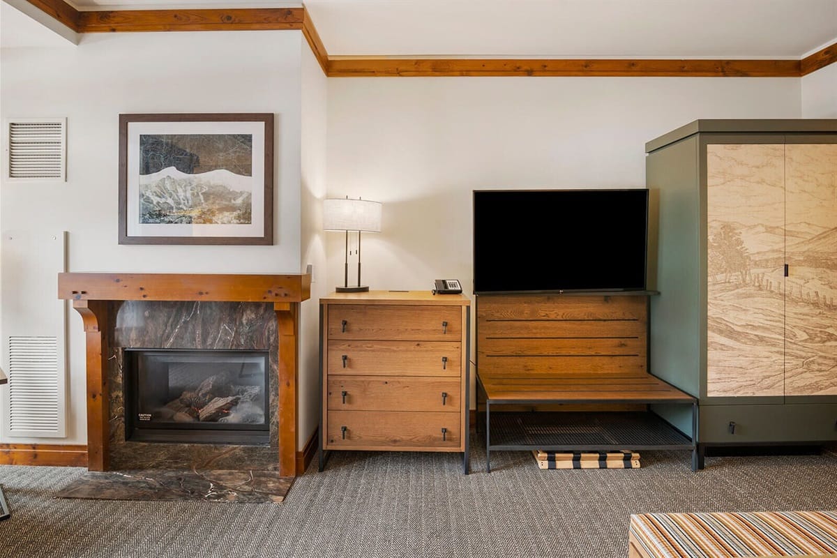 Cozy room with fireplace and TV.