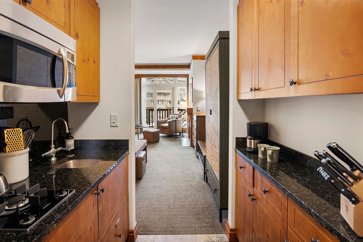 Kitchen leading to living area.