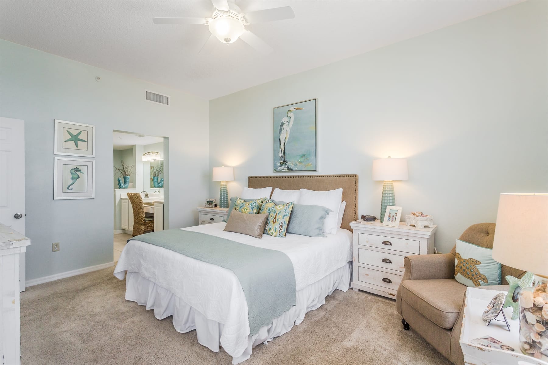 Coastal-themed bedroom with natural decor.