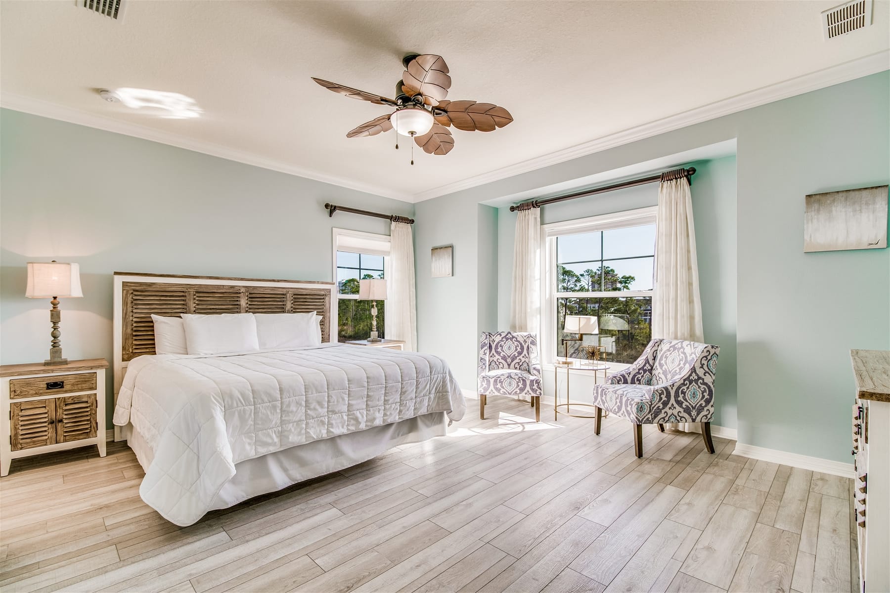 Bright bedroom with large window.