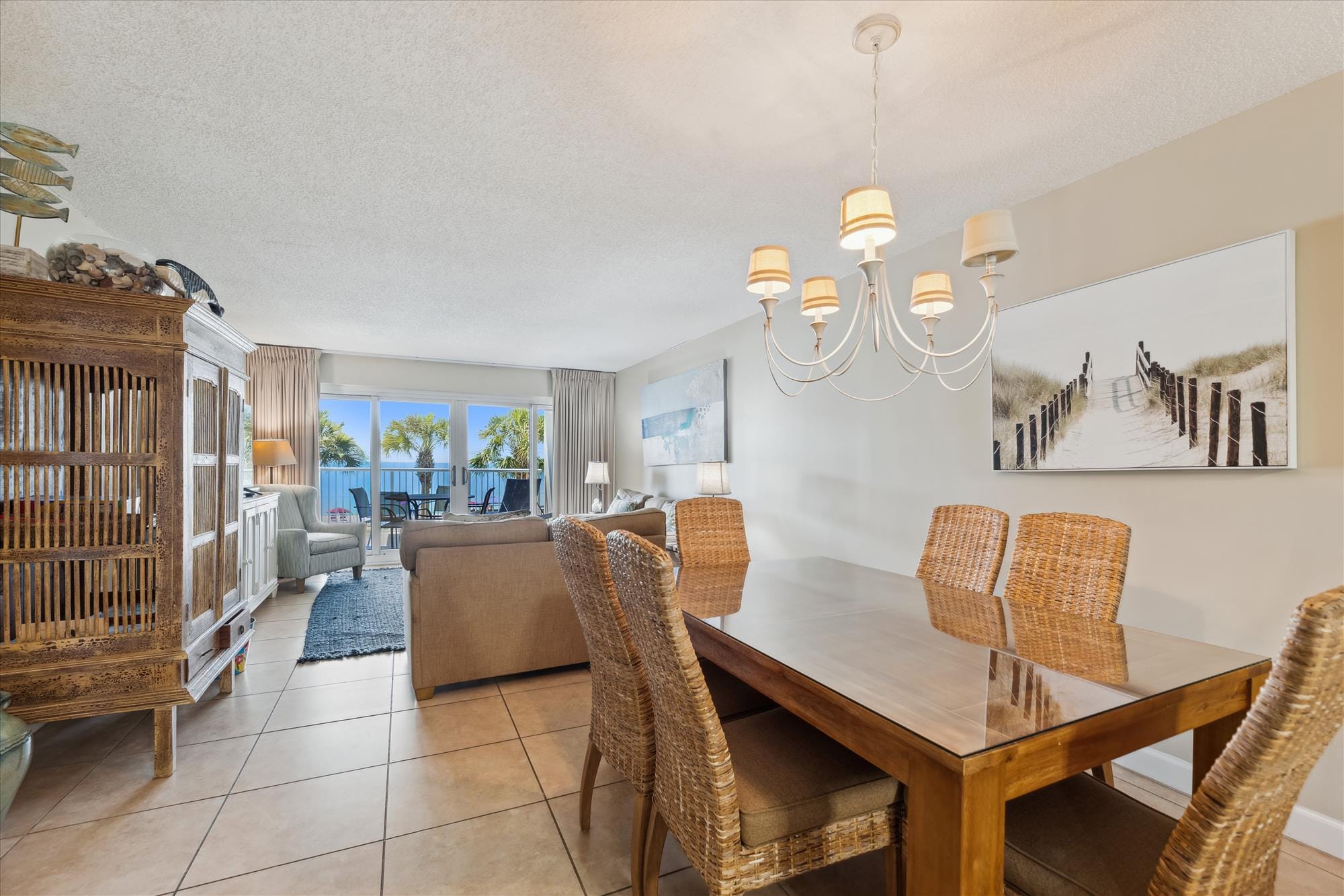 Coastal-themed dining and living room.