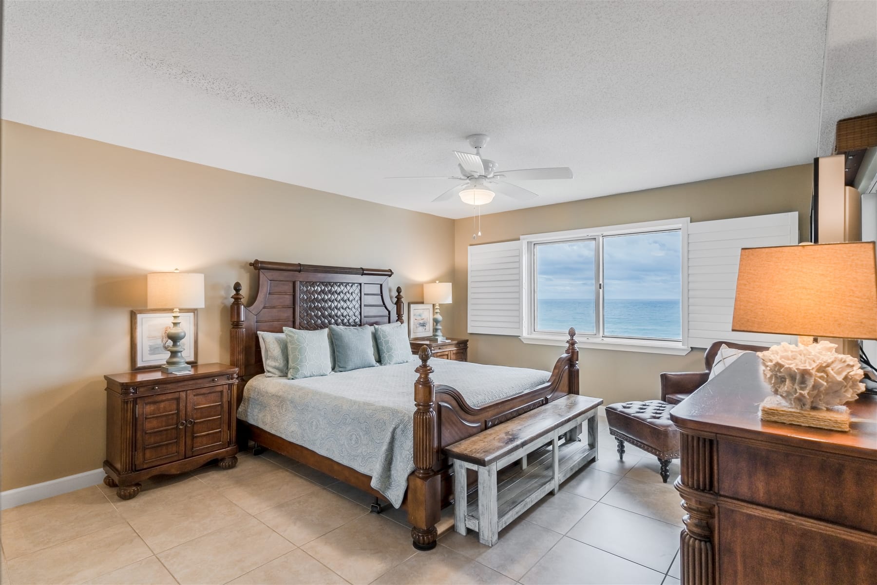 Bedroom with ocean view window.