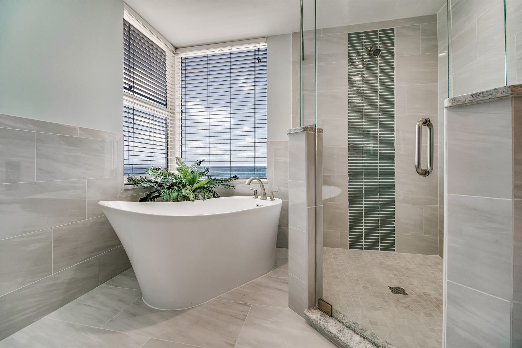 Modern bathroom with tub and shower.