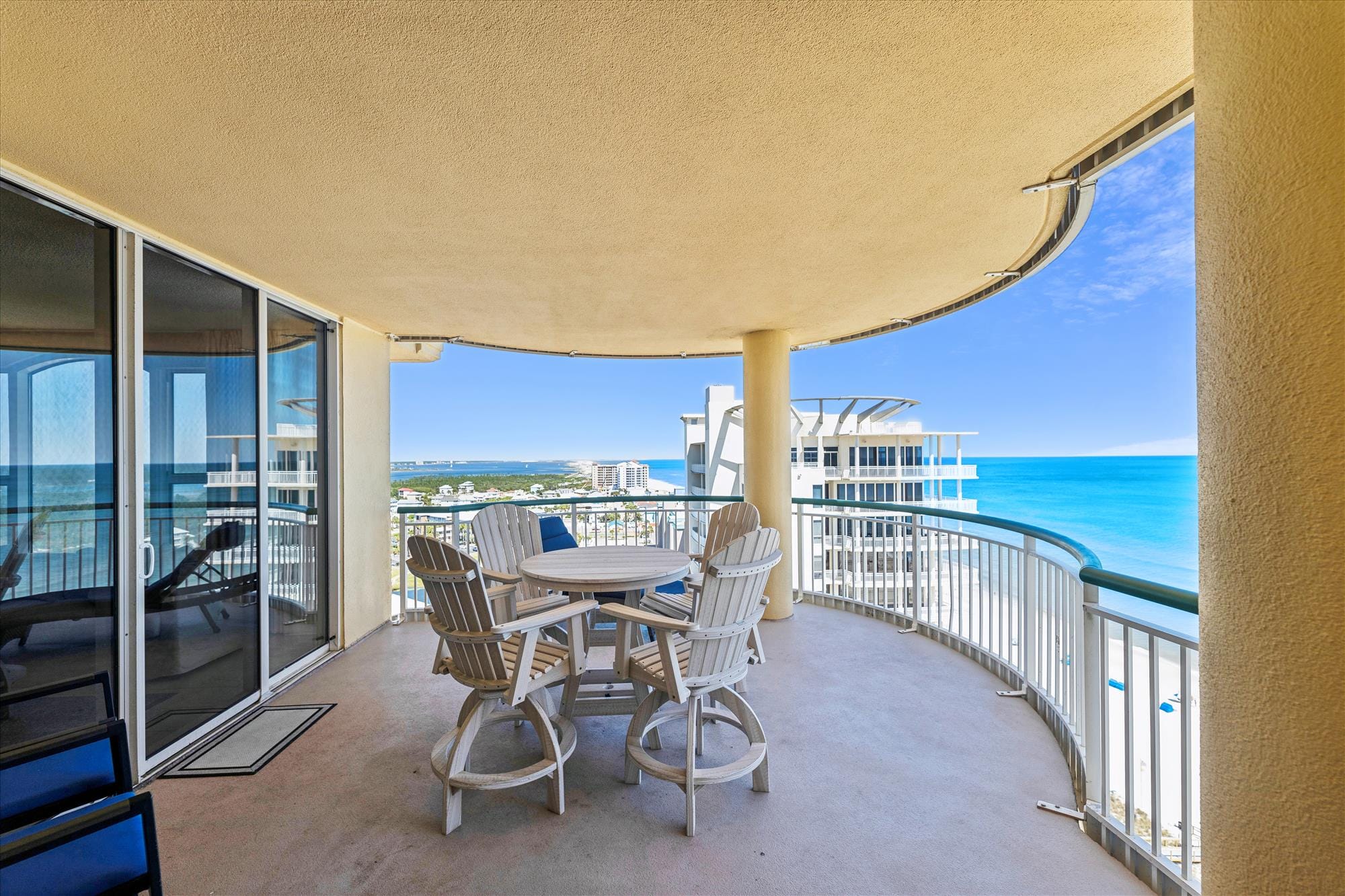 Beachfront balcony with ocean view.