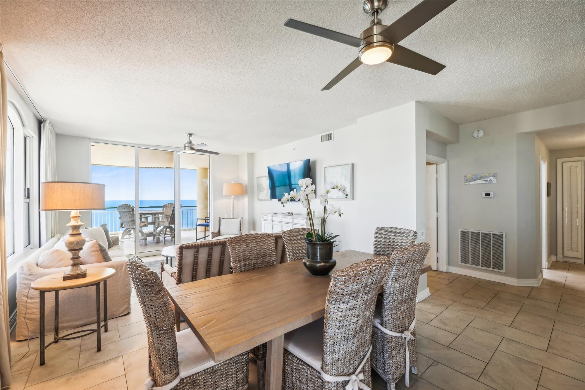 Open-plan living room with ocean view.