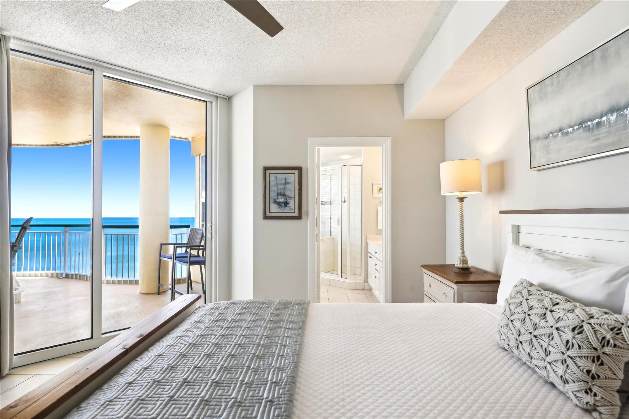 Bedroom with ocean view balcony.