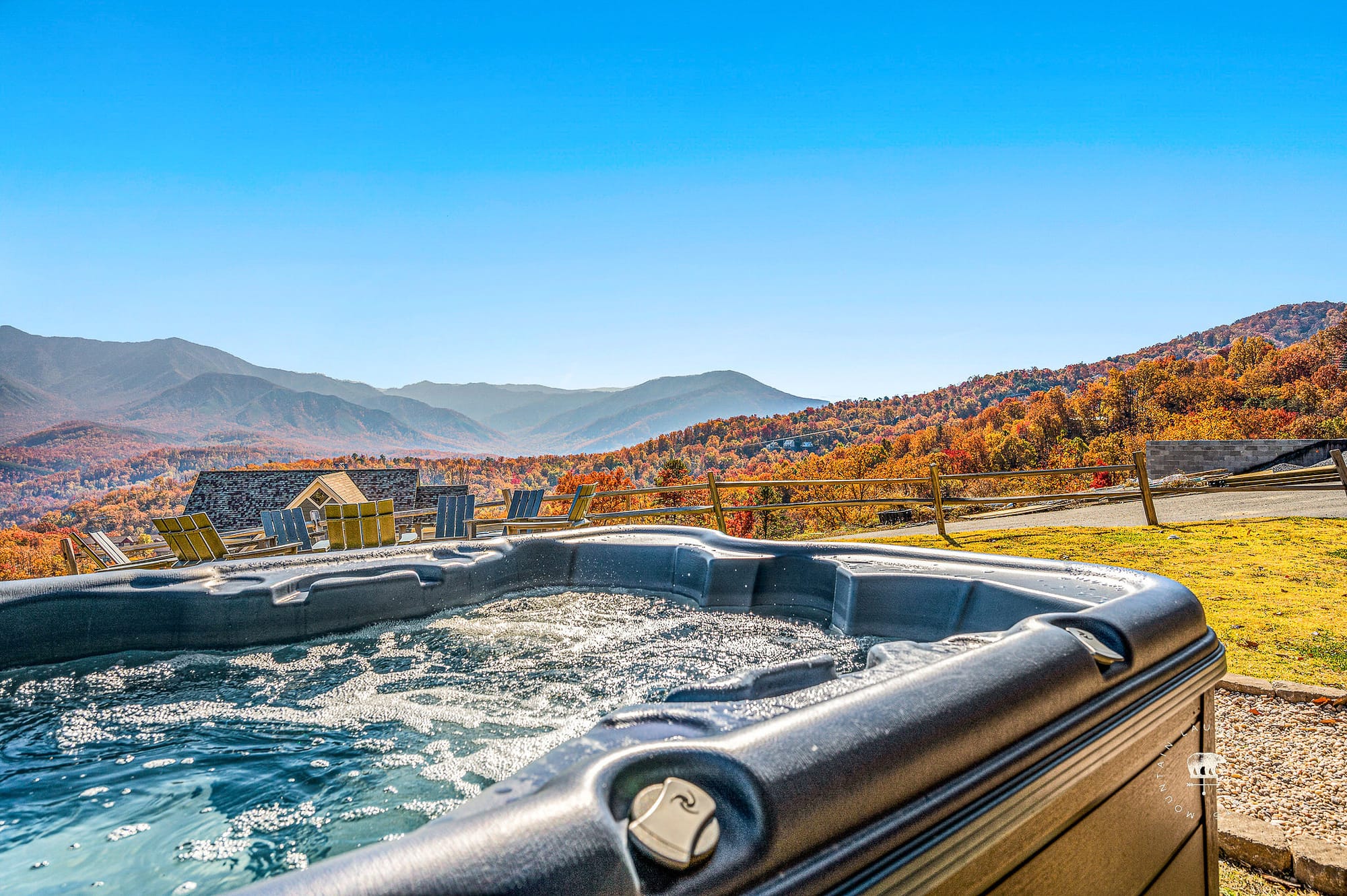 Hot tub with scenic mountain view.