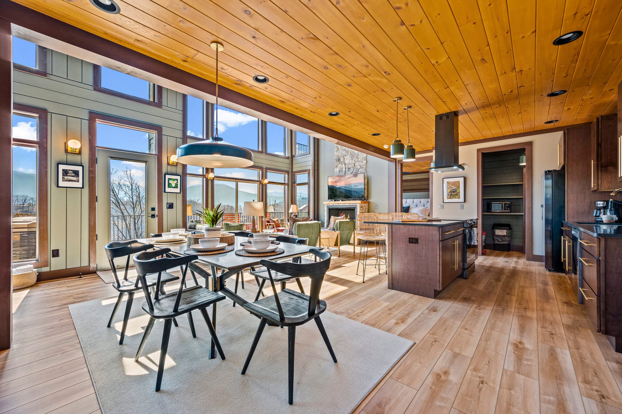 Spacious cabin kitchen and dining area.