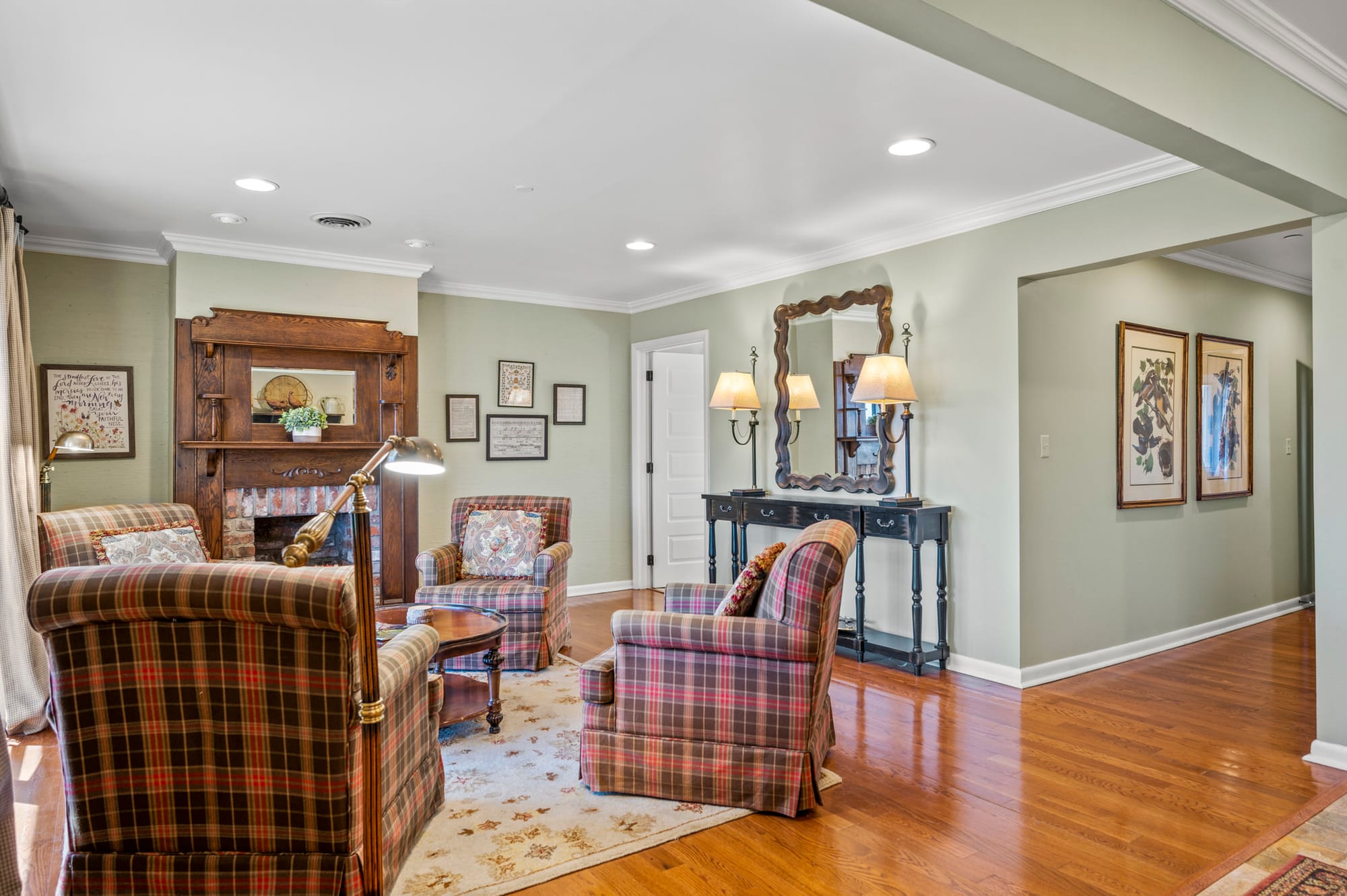 Cozy living room with plaid chairs.