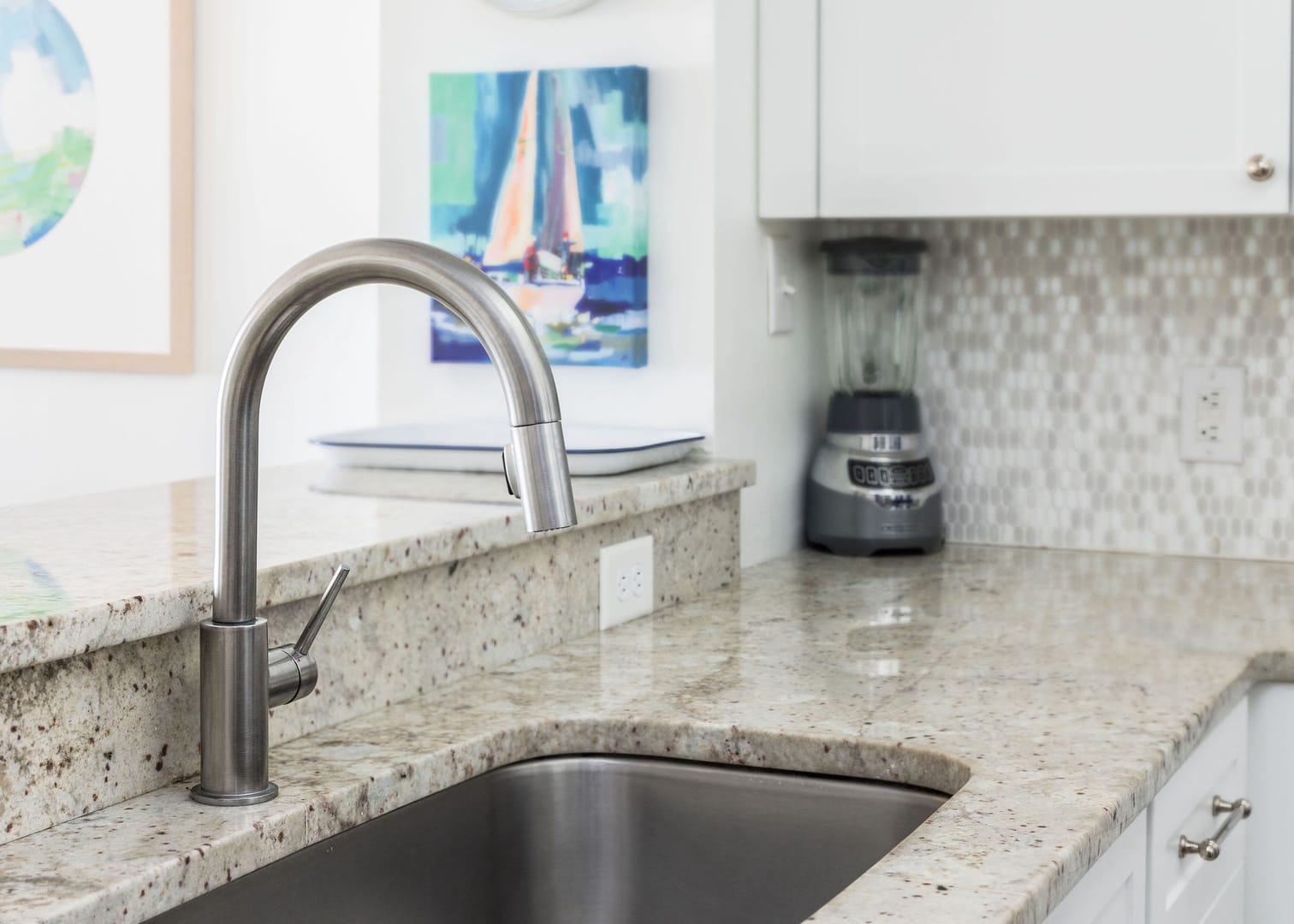 Modern kitchen sink with faucet.