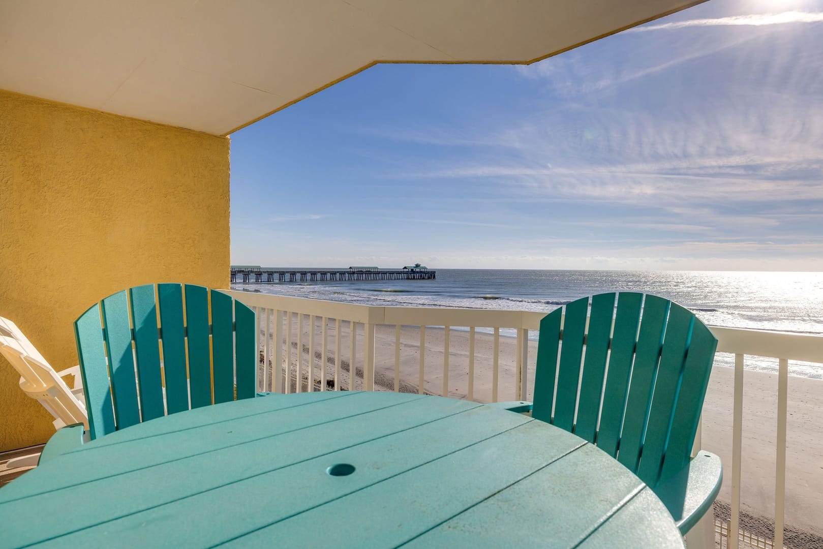 Beachfront balcony with ocean view.