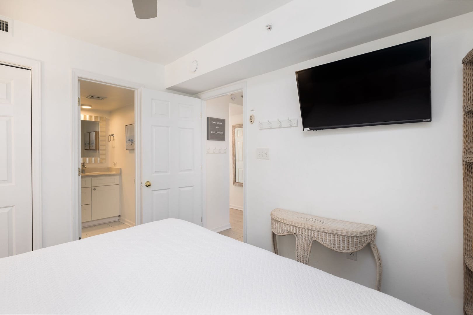 Bedroom with TV and bathroom.