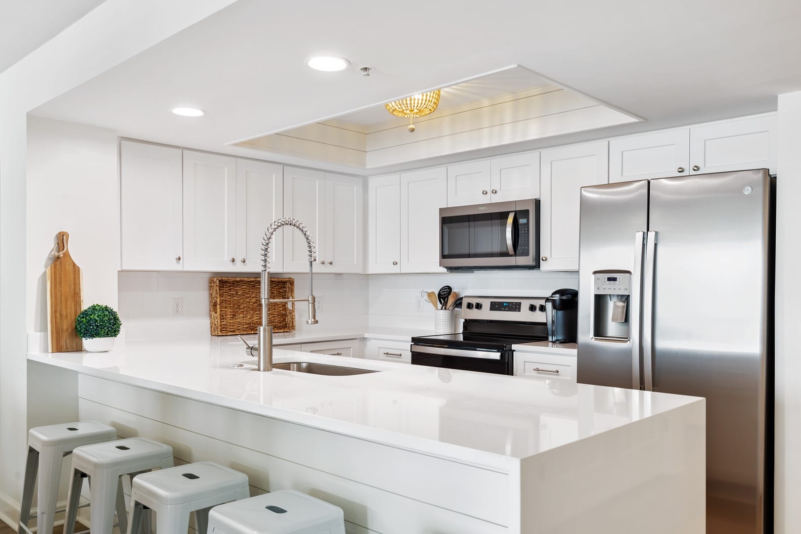 Modern white kitchen with island.