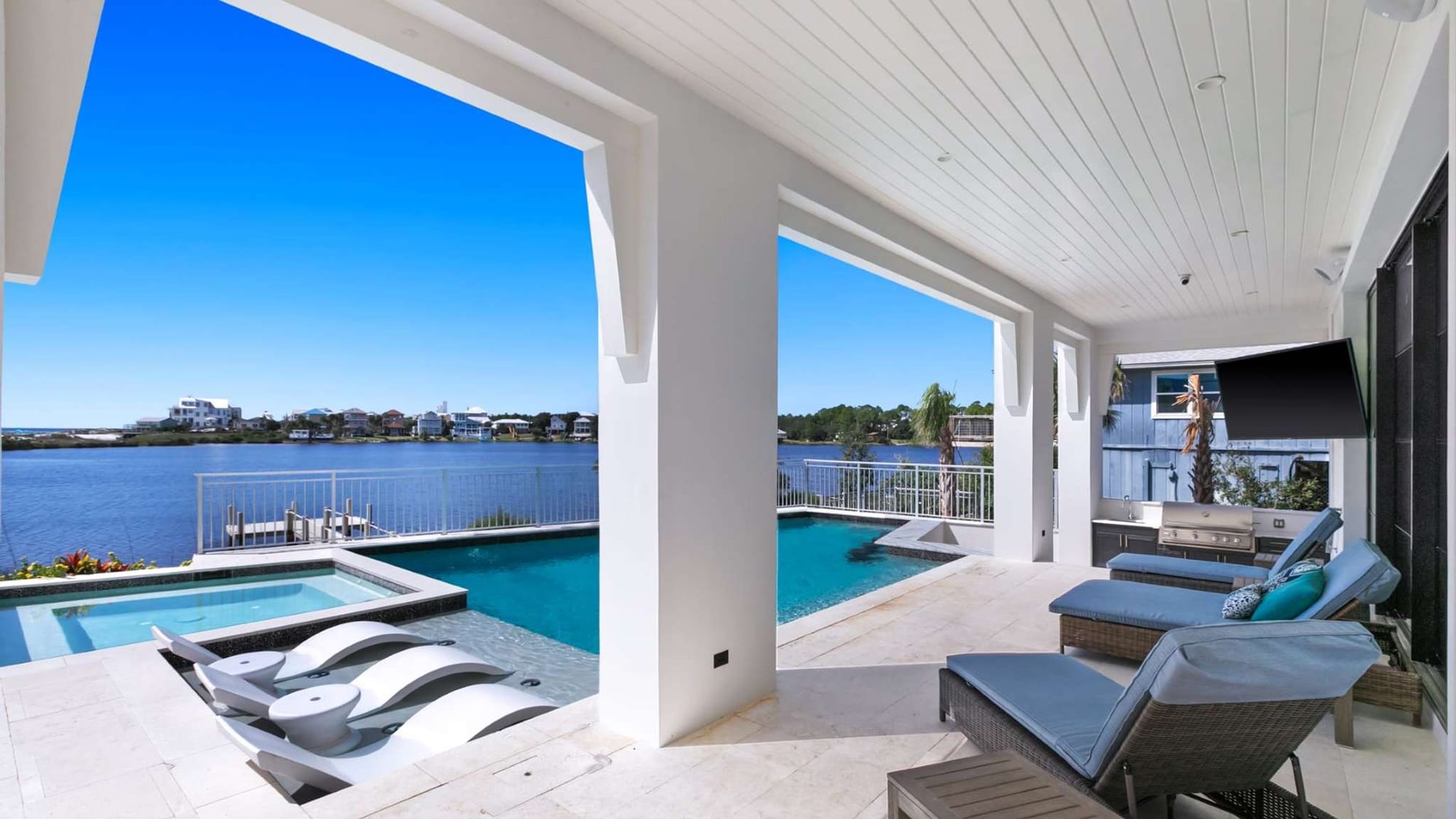 Lakeside patio with pool view.