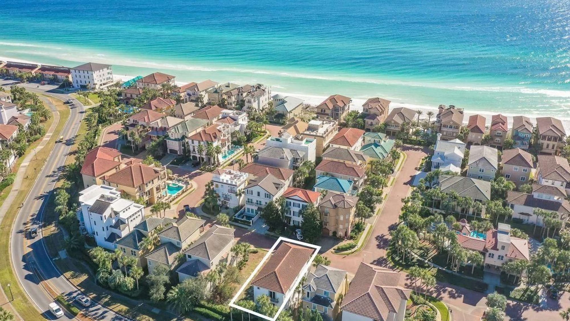 Aerial view of beachfront neighborhood.