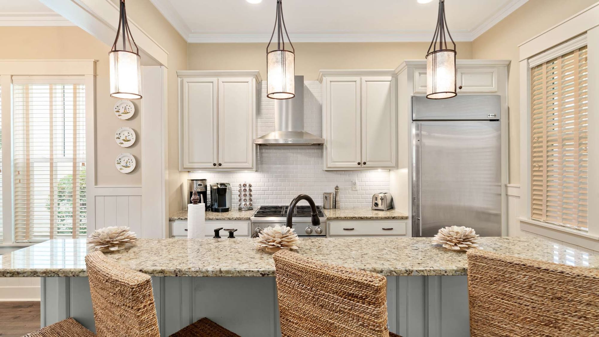 Modern kitchen with granite countertops.