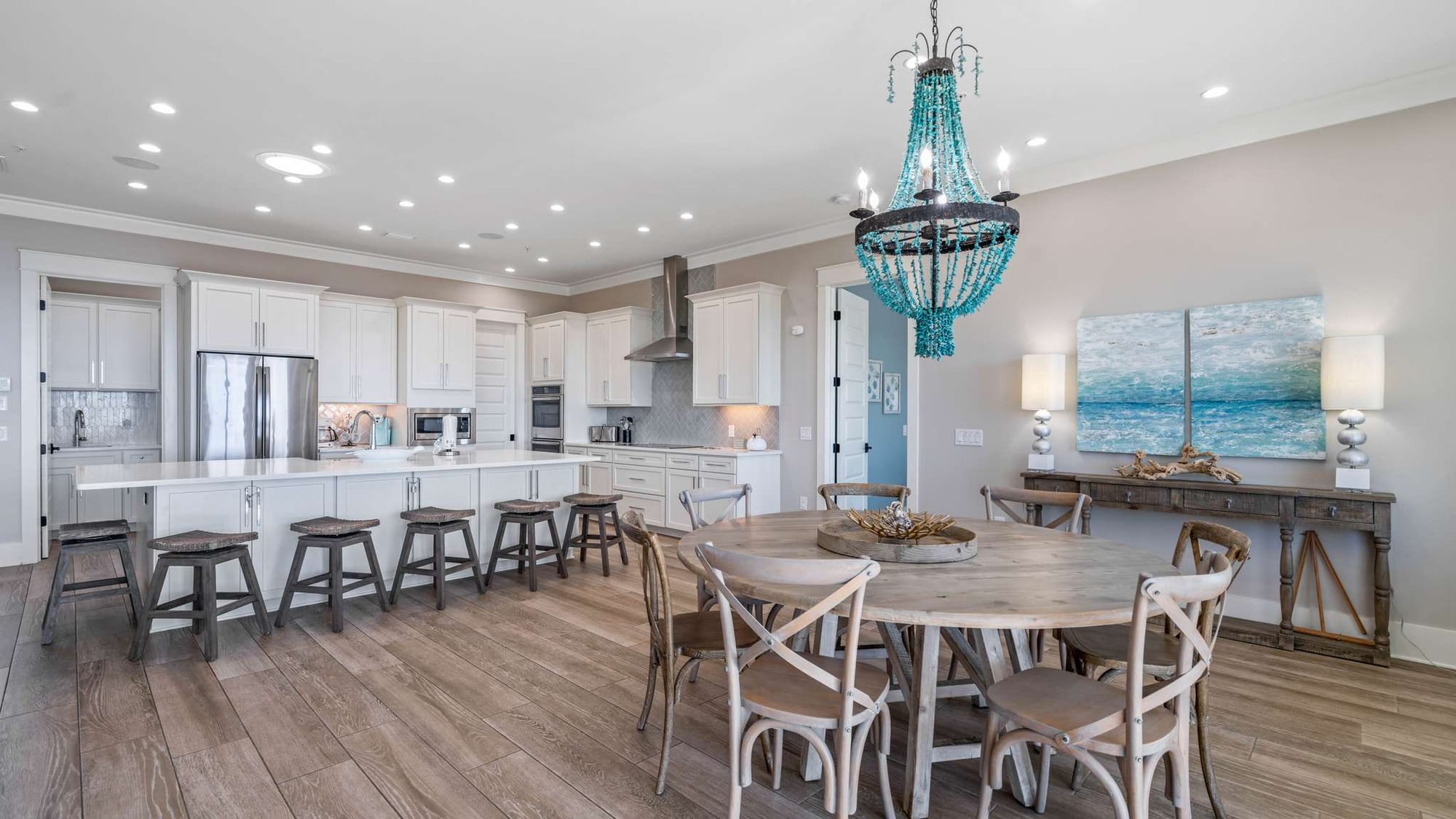 Modern kitchen with rustic dining table.