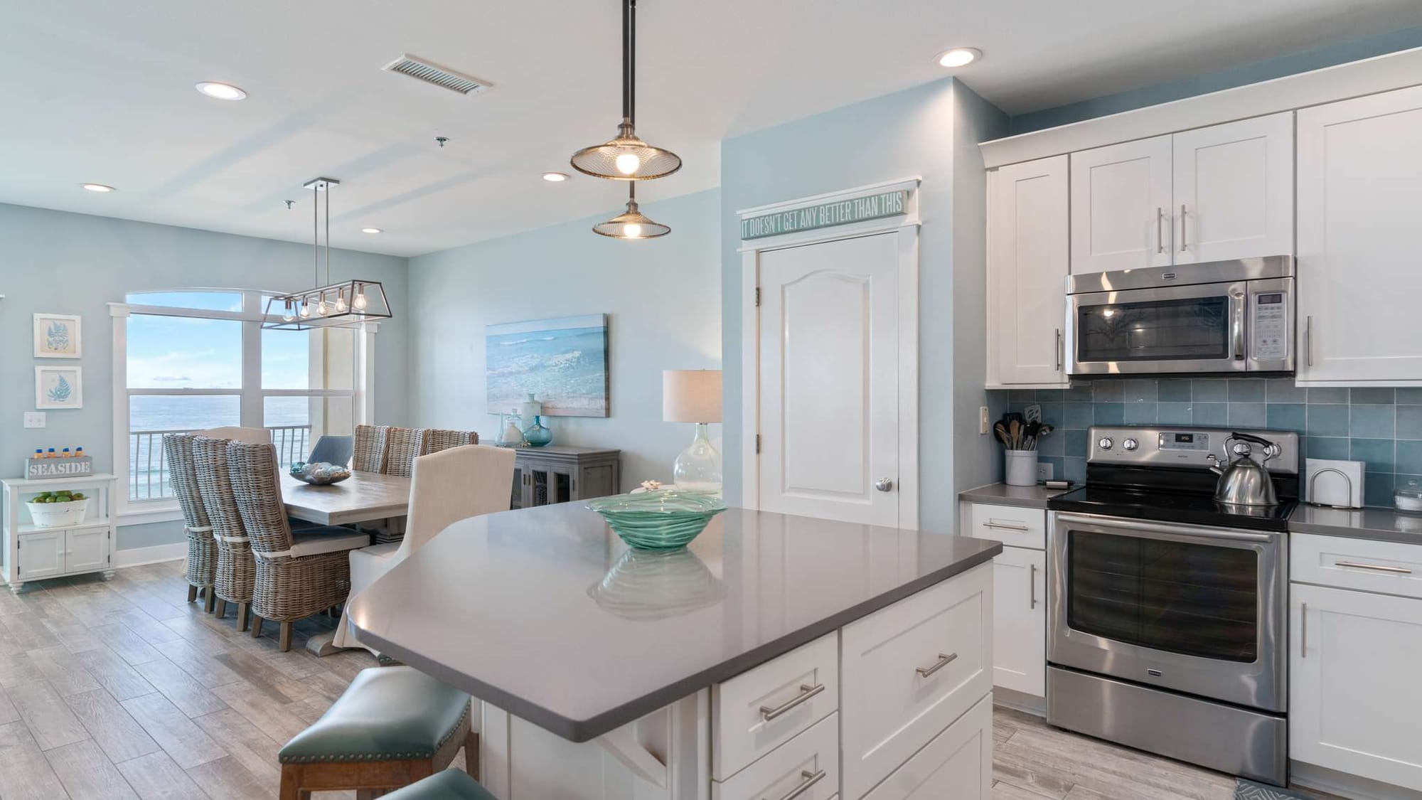 Beach-themed kitchen and dining area.