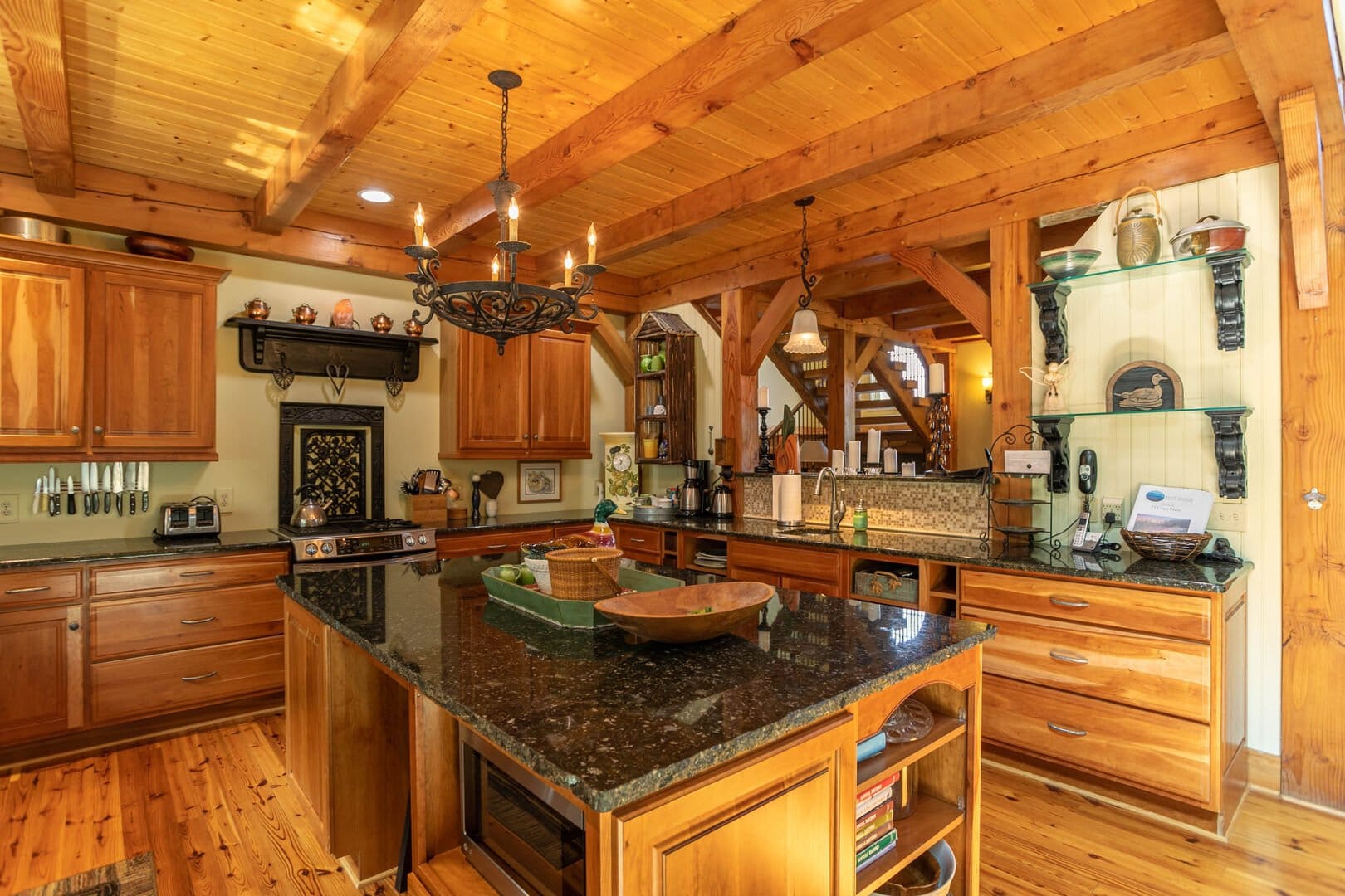 Rustic kitchen with wooden cabinetry.