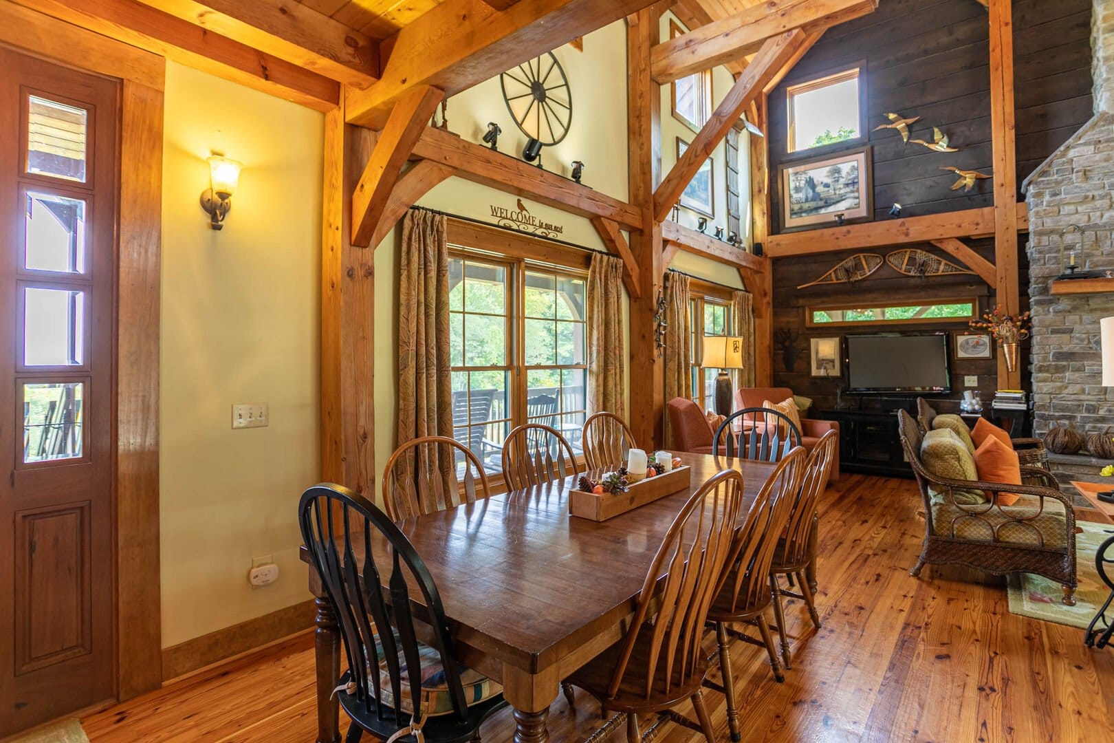 Rustic dining room with wooden beams.