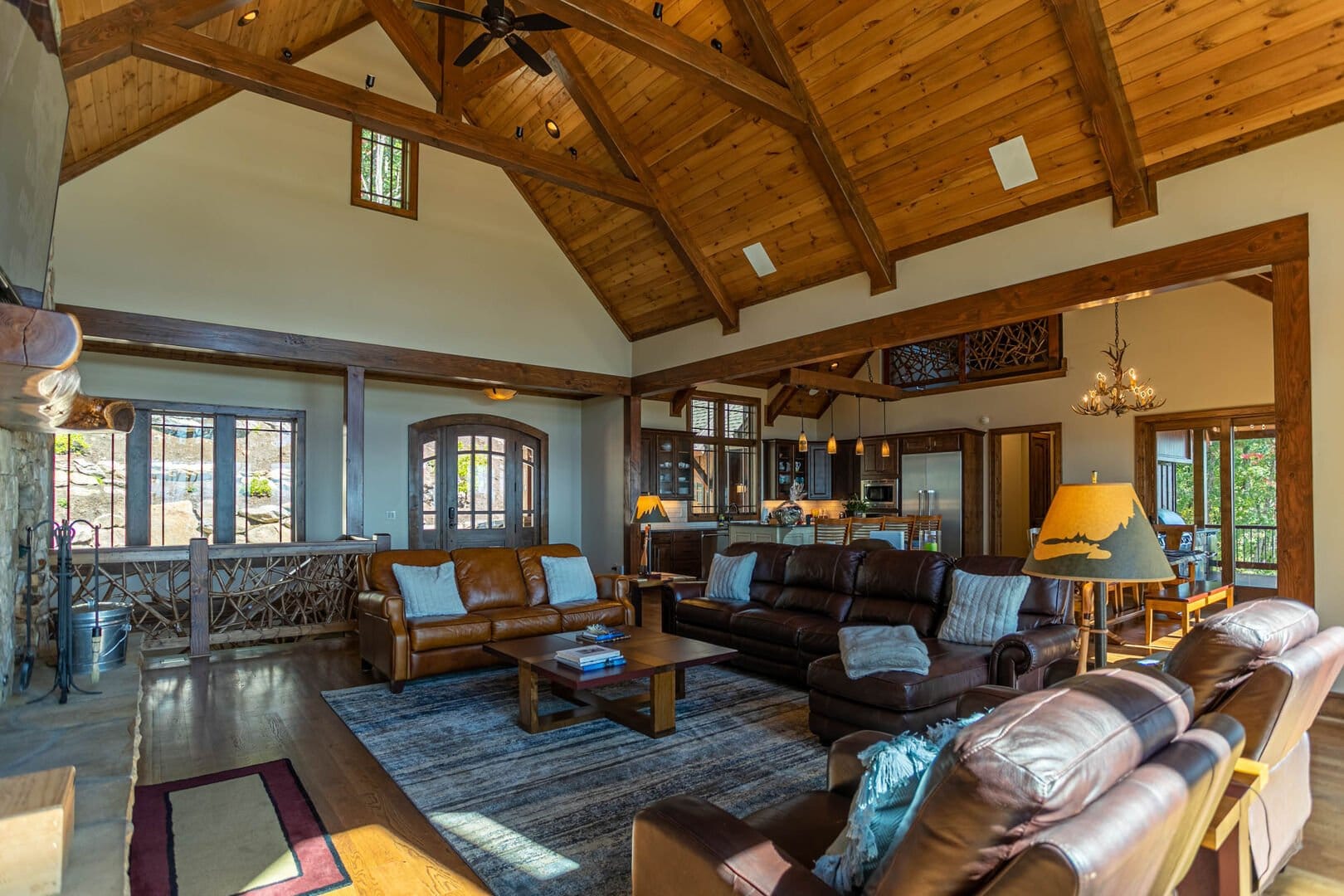 Rustic living room with wooden ceiling.