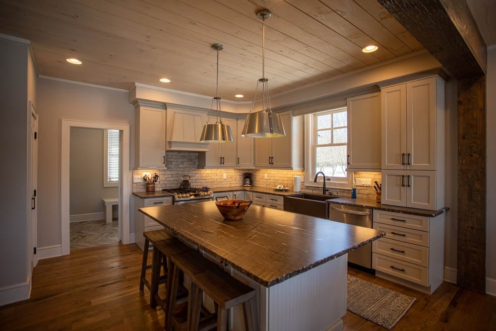 Warm, rustic kitchen with island.