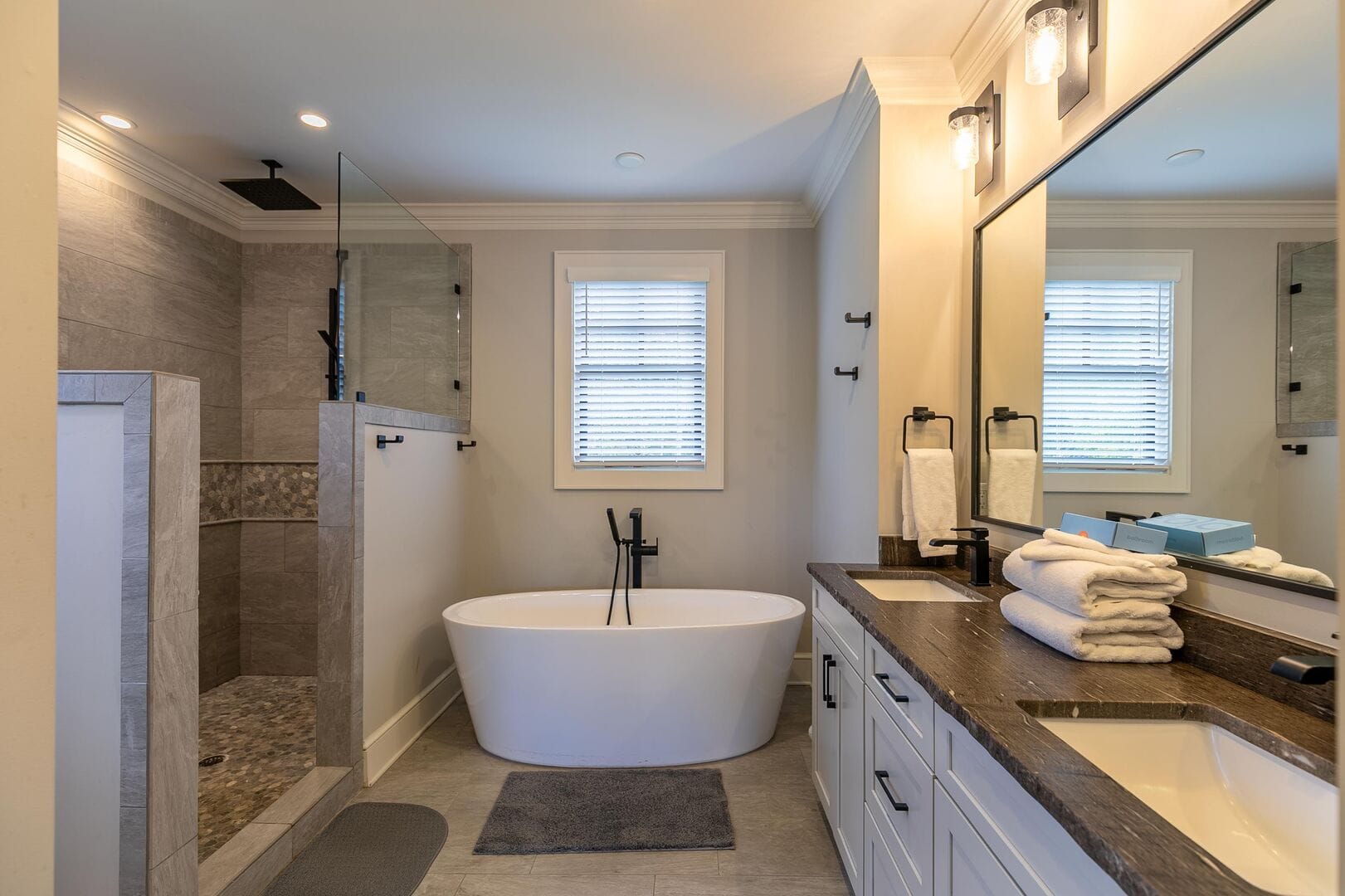 Modern bathroom with bathtub and shower.