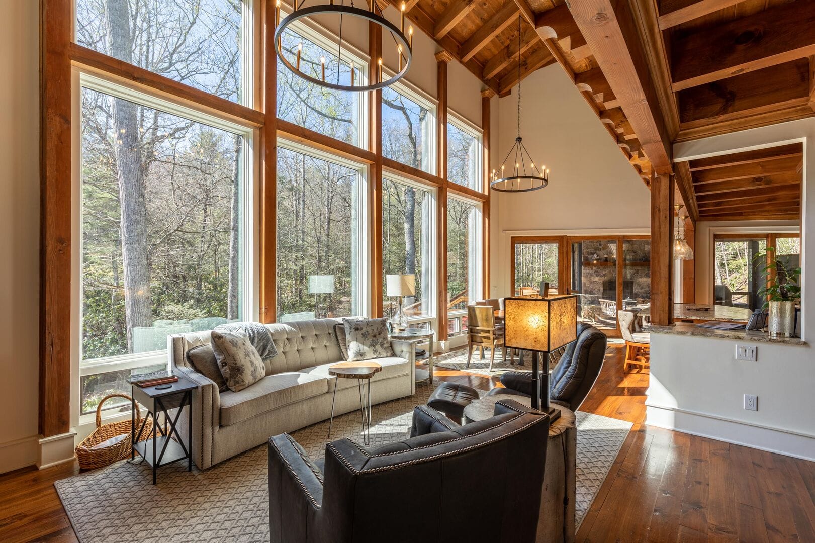 Spacious living room with large windows.