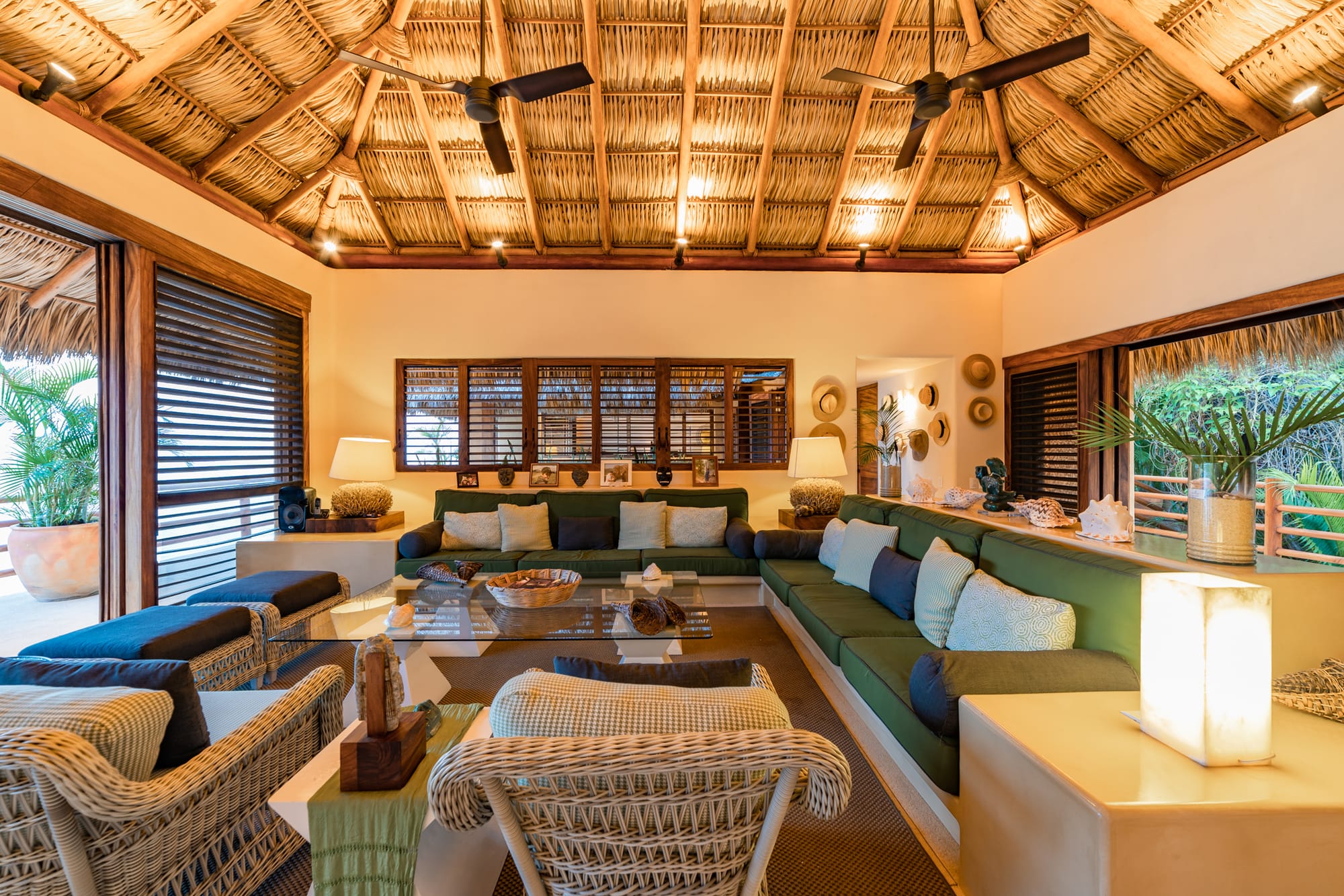 Tropical-themed living room with couches.