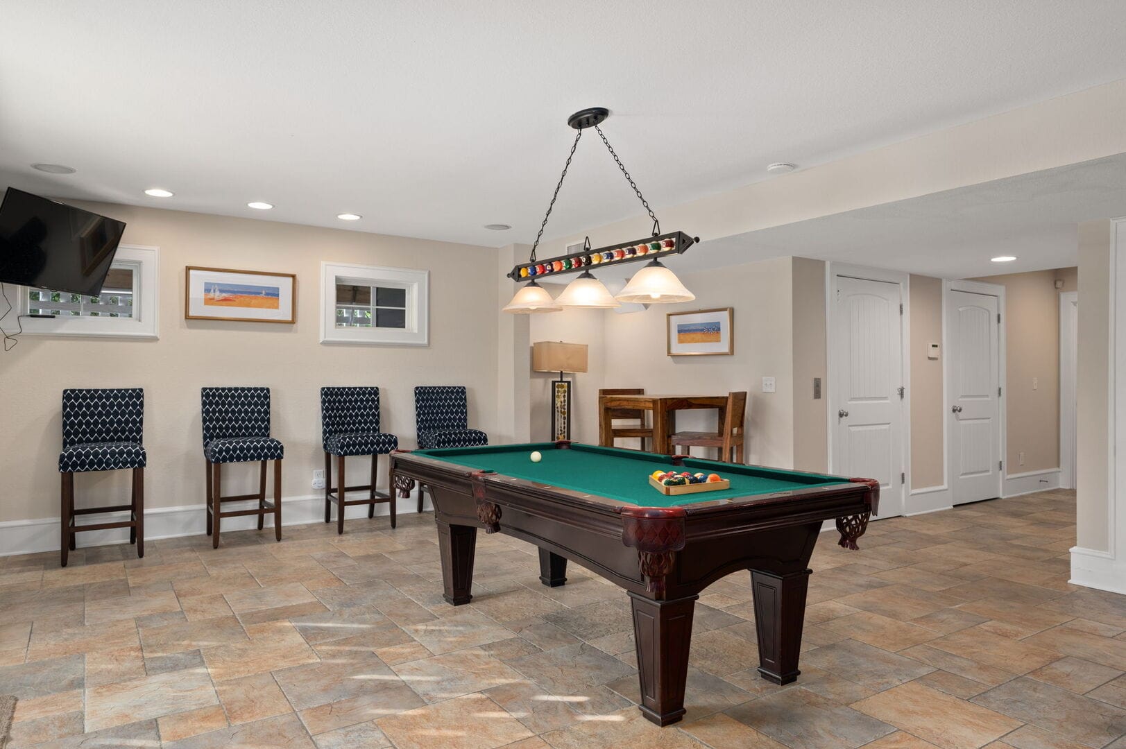 Game room with pool table.