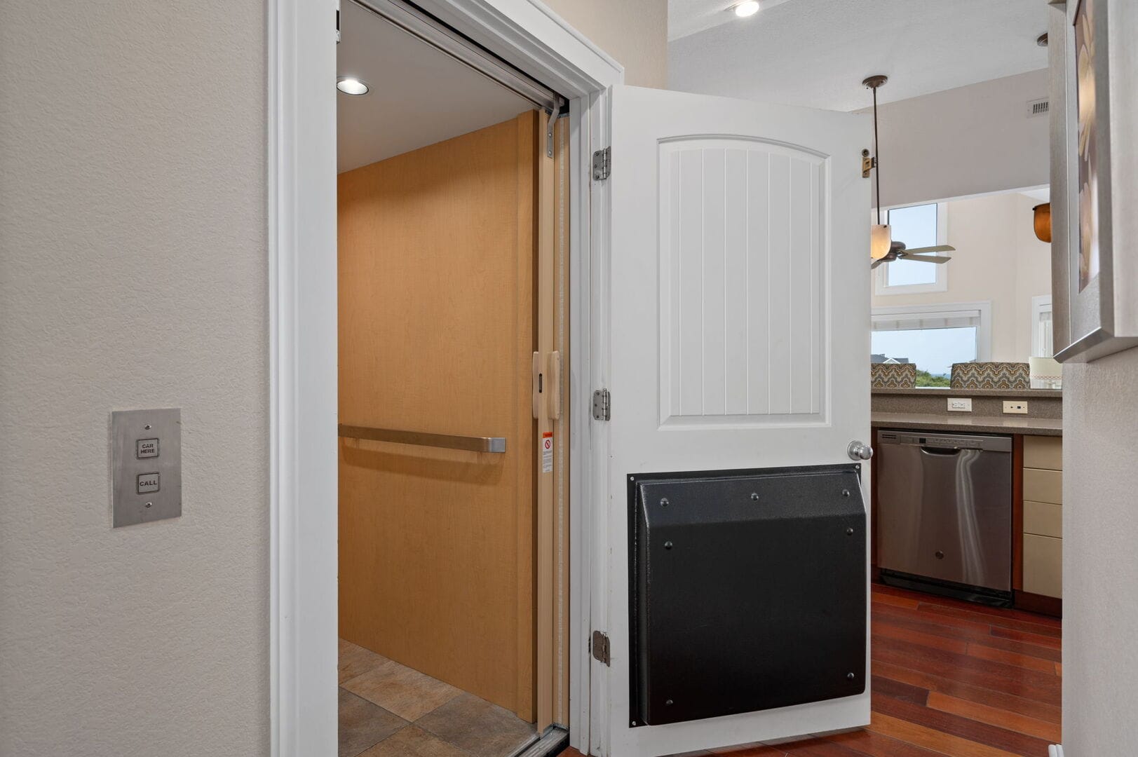 Home elevator near kitchen entrance.