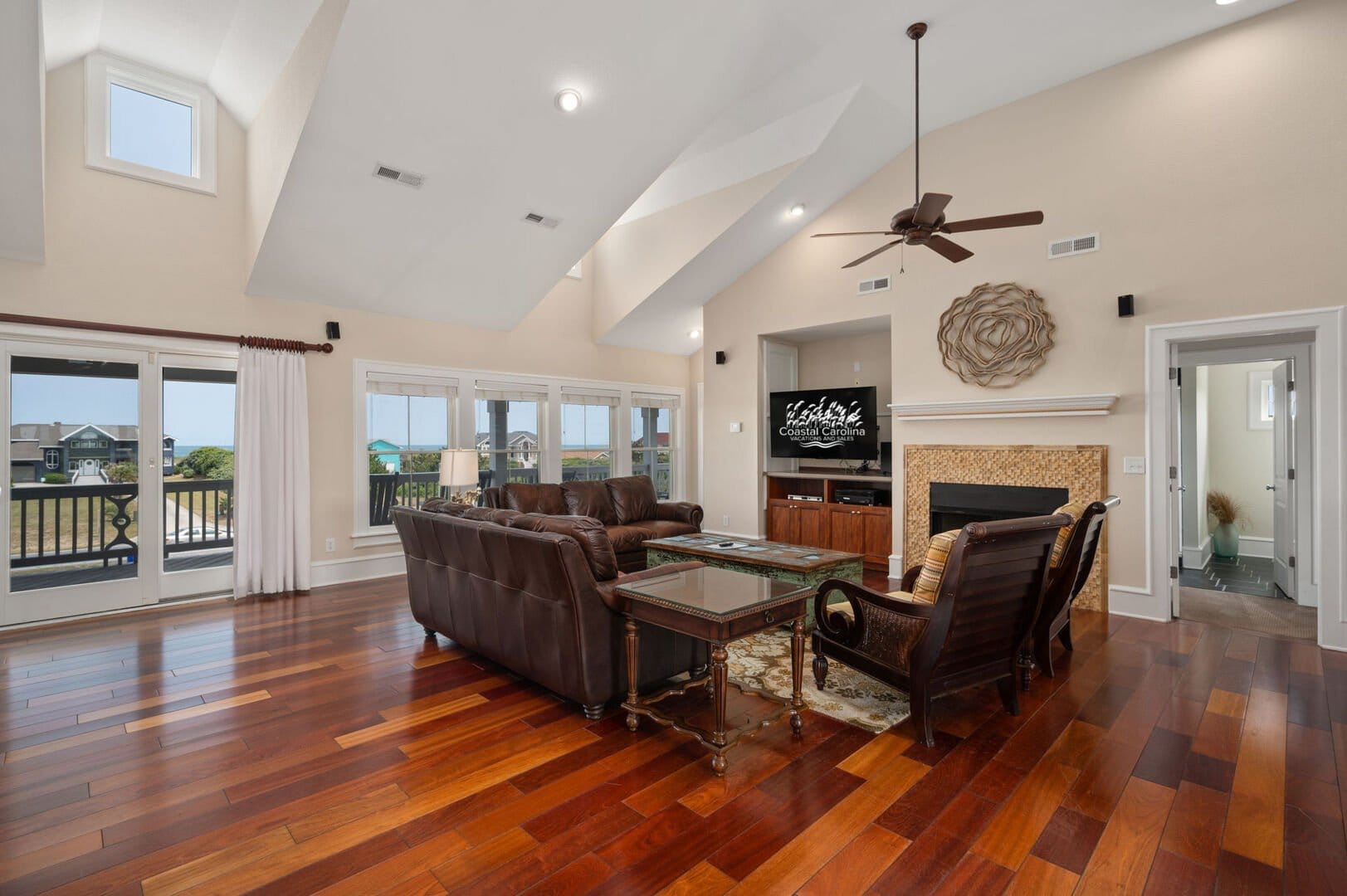 Spacious living room with fireplace.