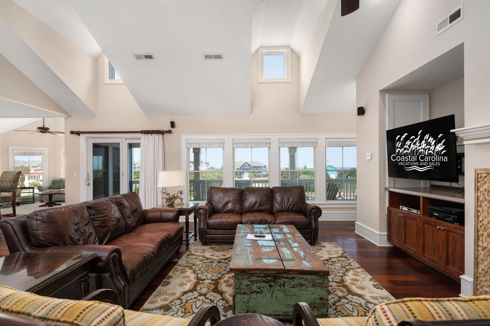 Cozy living room with leather sofas.