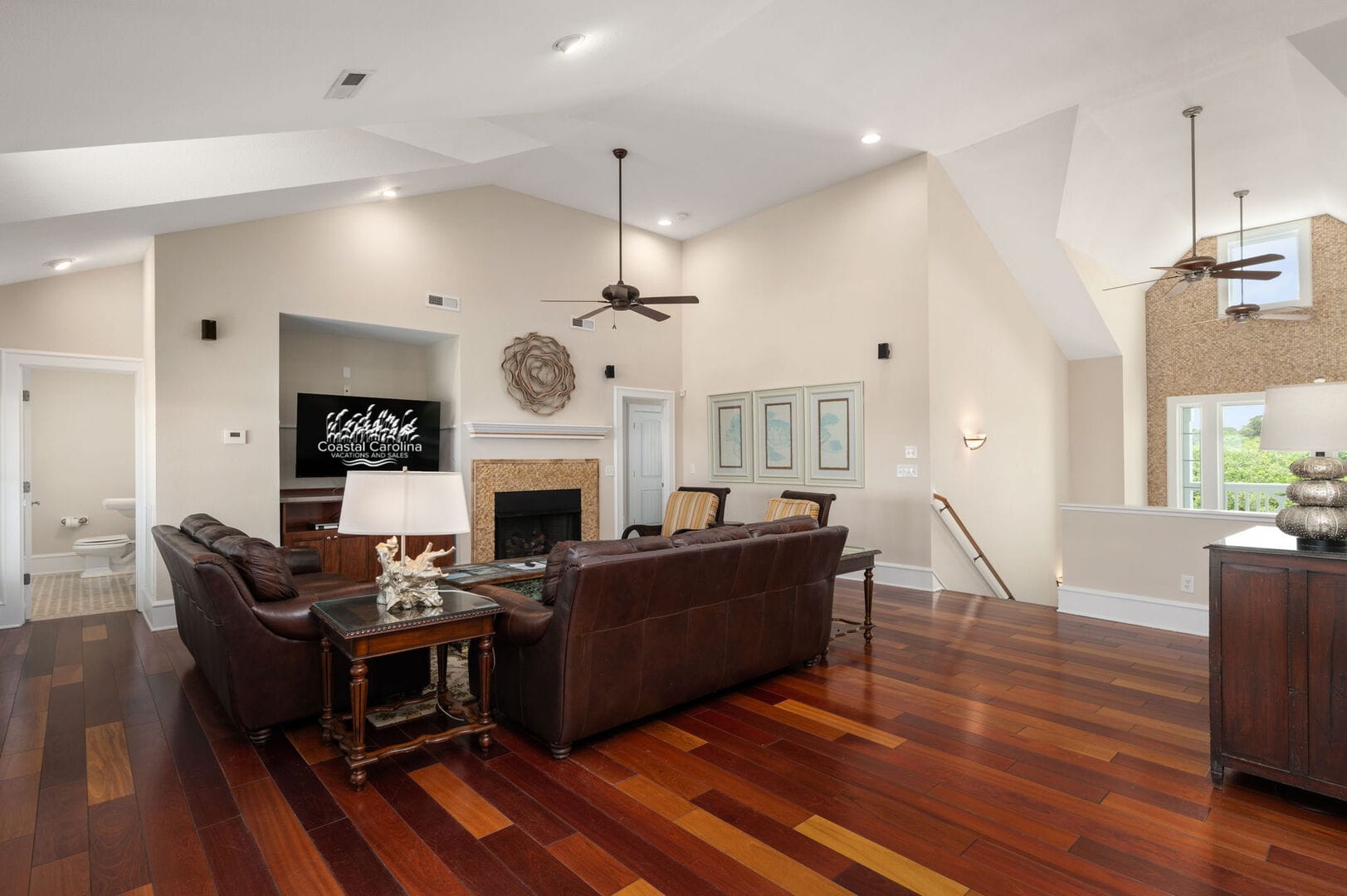 Spacious living room with fireplace.