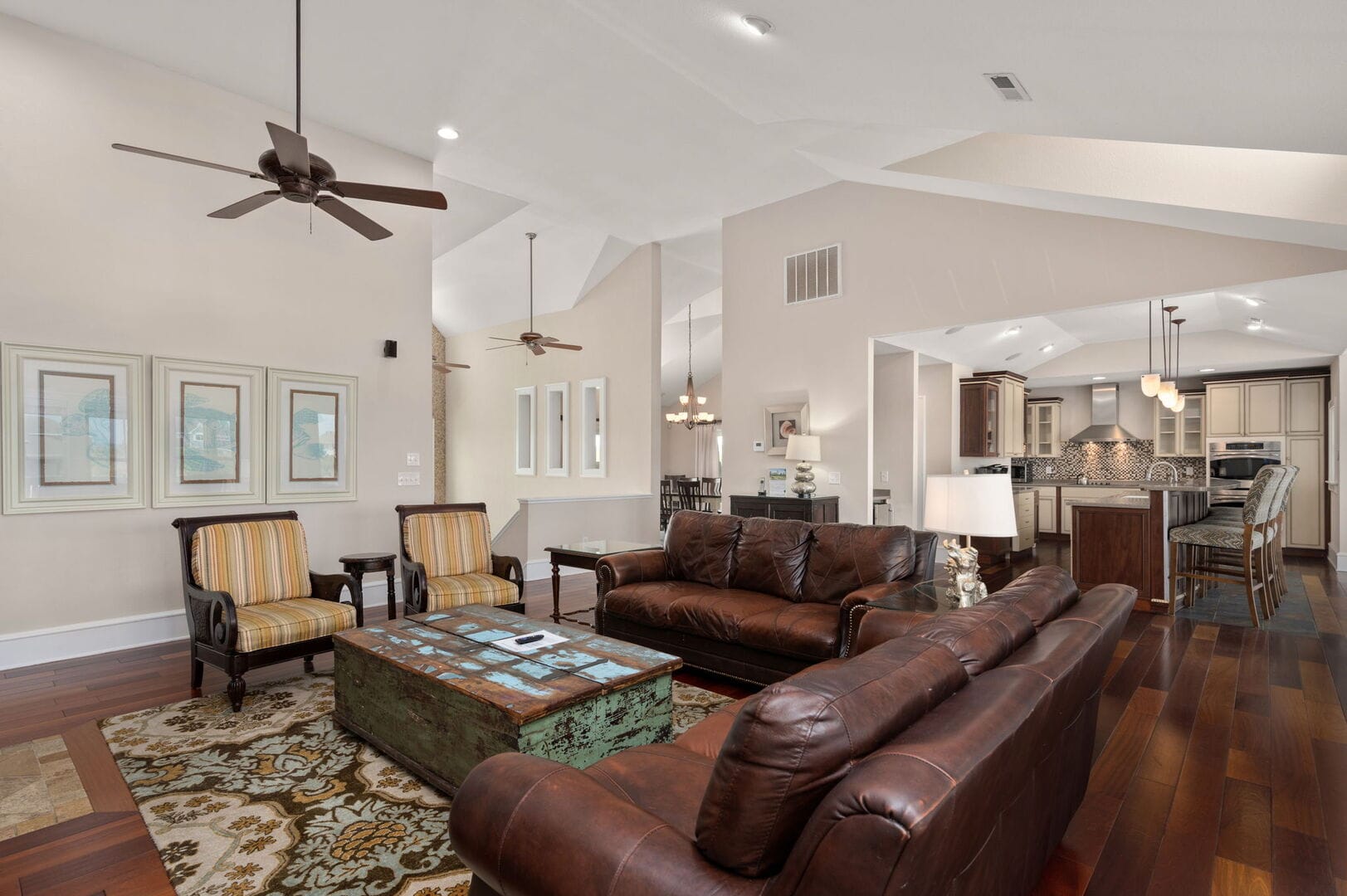 Open-concept living room with kitchen.