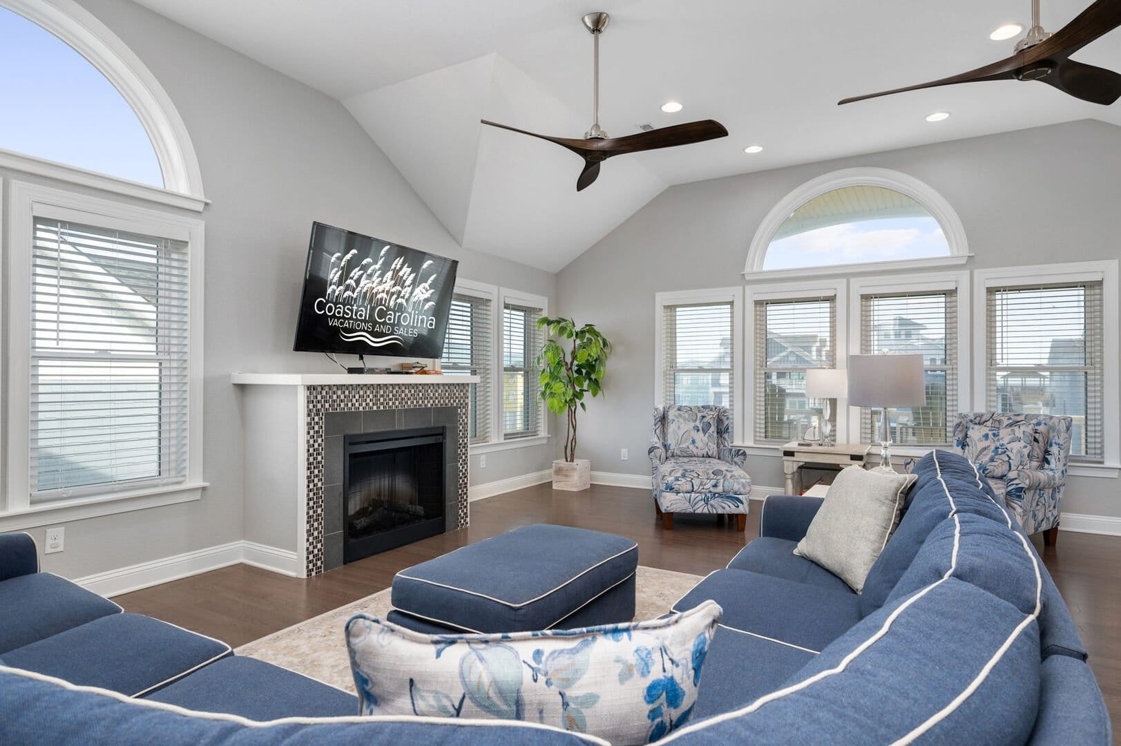 Coastal-themed living room with fireplace.